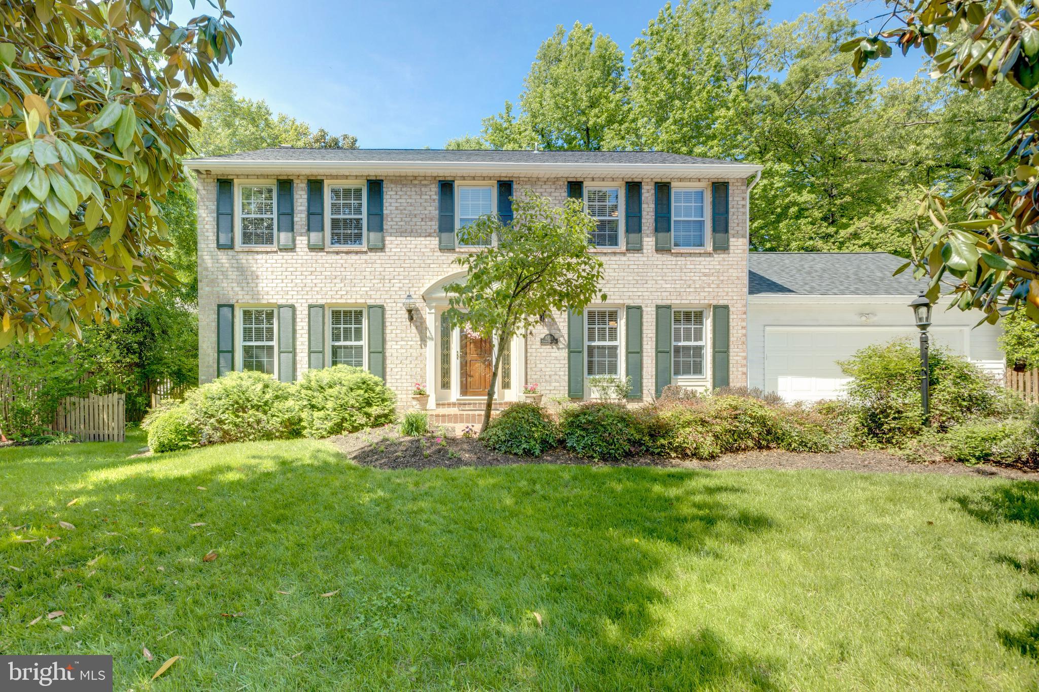 Impeccably cared for 5 bed, 3.5 bath, colonial home in the established neighborhood of Williamsburg Manor  --- straight out of the movies.  Newly refinished hardwood floors throughout the living, separate dining, kitchen, and family rooms. Fresh paint throughout the entire home. Large gourmet kitchen with ample storage. Brand new carpet in bedrooms on upper level. Lower level custom workshop, full bed/bath perfect for in-law suite, and cedar closet.  Serene patio and extensively landscaped backyard perfect for summer time parties. Plantings include Magnolias, Japanese dogwoods, Bradford pears, Lilies,and Azaleas. Brand new, extended driveway. Walk to Fort Hunt Park for family entertainment, recreational sports, and quiet walks.*****Sq footage does not include below grade- seller does not know exact amount, at least 1800 in additional finished sq feet.