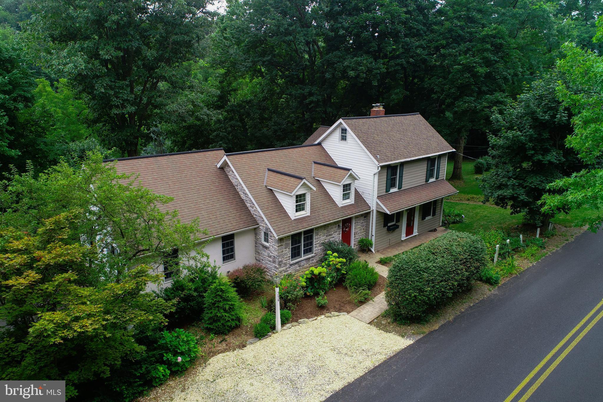Come and enjoy this beautiful well cared for home in Lititz situated on a  private 3.9 acres. This lot features woods, stream and fence however is conventienly located to schools, shops and restaurants.  This home features 2 master bedroom suites on the main floor, exposed beams, 2 zoned heating/AC, den/library with built in bookshelves, a walk out/finished basement with 2 family rooms, and a stone fireplace. Enjoy the large stamped concrete patio and deck, as you overlook the beautiful lot. This space was made for entertaining. Schedule your showing today.