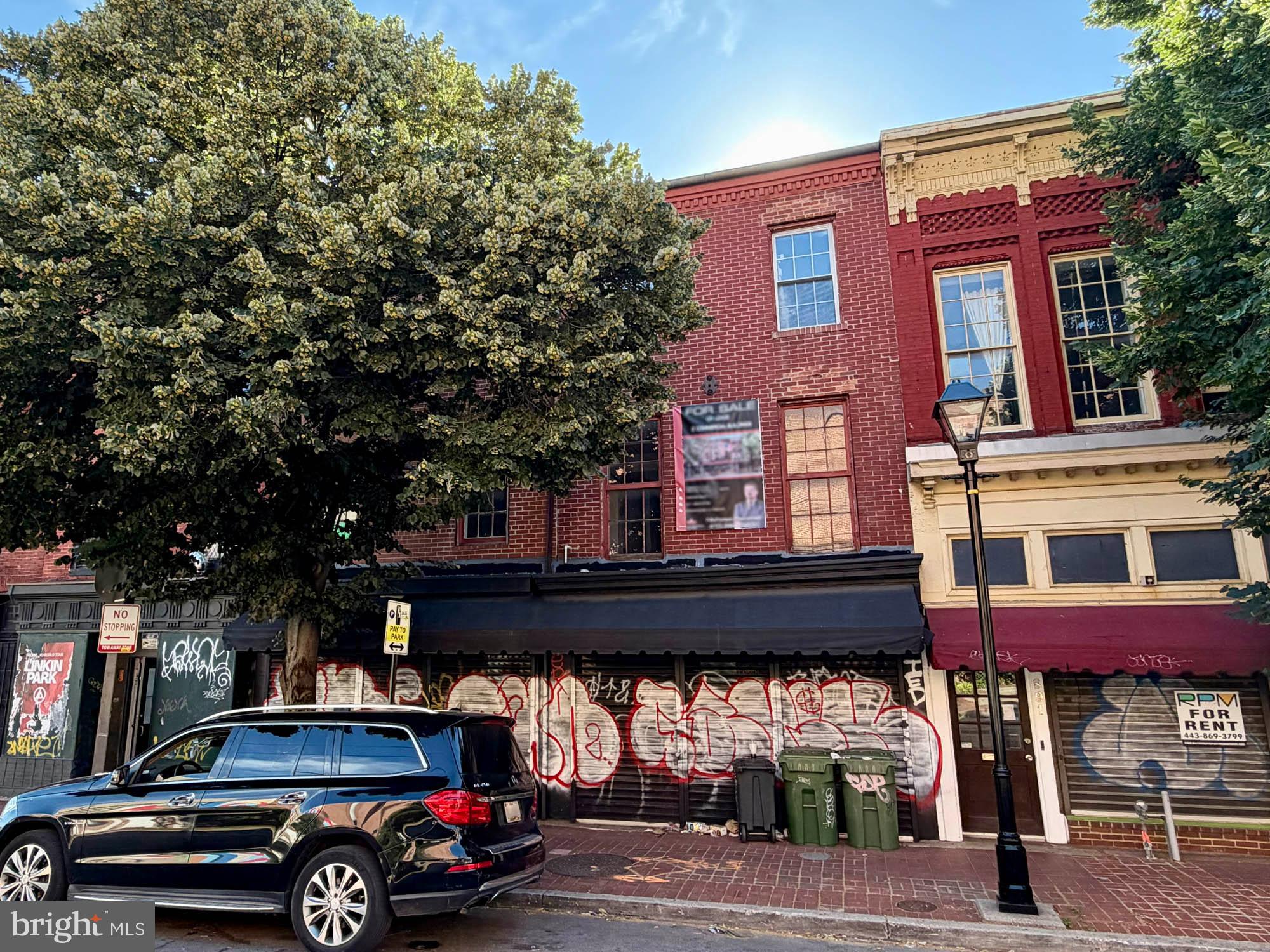 REAL ESTATE AUCTION featuring ON SITE and SIMULCAST ONLINE BIDDING!! Online Bidding Opens - Tuesday, June 23, 2026. Live Onsite Auction - Wednesday, June 24, 2026 at 11:00 AM. List price is opening bid only. Live Auction Bidders – a $25,000 deposit, payable by cashier’s check, will be required of the purchaser at time and place of sale. Online Auction Bidders – A deposit of $25,000, payable by cashier’s check or wire, will be required of all online bidders prior to the start of the live auction. The deposit will be held in escrow until the completion of the auction and will be retained from the winning bidder. Other bidder deposits will be returned within one business day. Owner’s sale of two adjoining three story brick buildings in the Antiques Row area of Mount Vernon in Baltimore. The partially updated property is currently arranged as an entertainment venue, and is suitable for development for retail, multifamily, office or mixed-use. Antiques Row is situated in the cultural heart of the City, opposite University of Maryland Midtown Hospital, near MICA, UB, the Baltimore Symphony Orchestra and less than one mile from Penn Station. The auction provides an opportunity to purchase adjoining buildings with significant square footage, favorable zoning and in a location surrounded by Baltimore’s primary attractions.