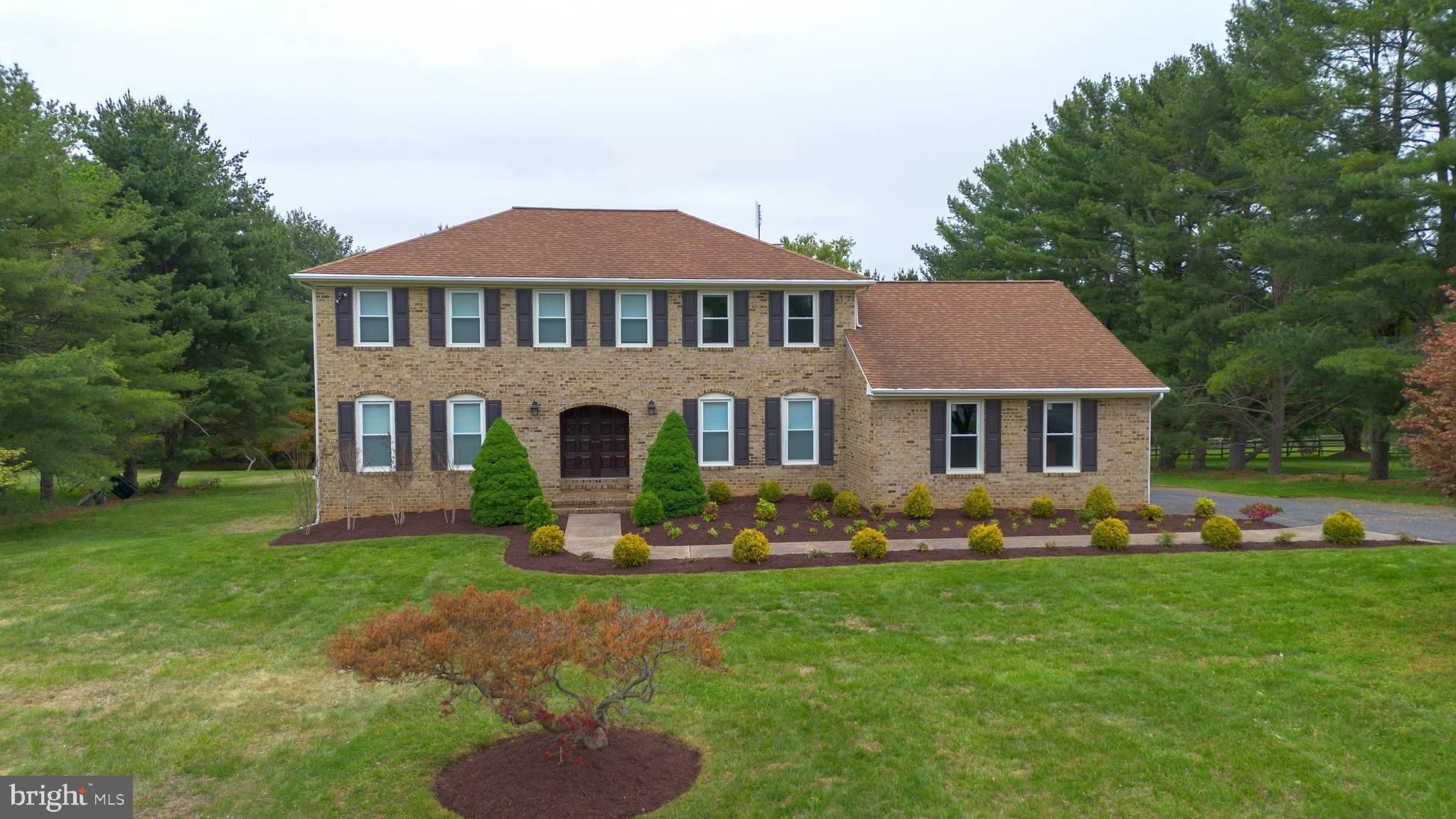 Welcome to 20809 Merle Dr, where space, comfort, and charm come together on a stunning 1.15-acre lot. This beautifully maintained 4-bedroom, 2.5-bath home offers the perfect blend of indoor elegance and outdoor enjoyment, featuring gorgeous landscaping, a spacious backyard, and an incredible Trex deck ideal for entertaining, relaxing, and enjoying warm-weather gatherings. Step inside to find beautiful hardwood floors and a thoughtfully designed layout perfect for everyday living and hosting alike. The main level features formal living and dining rooms, along with a versatile flex room ideal for a home office, gym, playroom, or additional sitting area. At the heart of the home is the updated kitchen, complete with granite countertops, stainless steel appliances, and views overlooking the backyard. The kitchen flows seamlessly into the breakfast nook and inviting family room, where a stunning brick fireplace creates a warm and welcoming focal point. The main level also includes a convenient half bath, laundry area, mudroom/drop zone, and interior access to the attached 2-car garage. Upstairs, you’ll find four spacious bedrooms, including an updated hall bath and a true primary retreat featuring a beautifully renovated en-suite bath and walk-in closet. Carpet has also been replaced within the last year. The fully finished walkout basement offers even more living space, perfect for movie nights, game days, entertaining, or creating the recreation area of your dreams, plus a dedicated storage room for added convenience. With timeless updates, generous living spaces, and an incredible lot, this home is a rare opportunity you won’t want to miss! Book a private tour today!