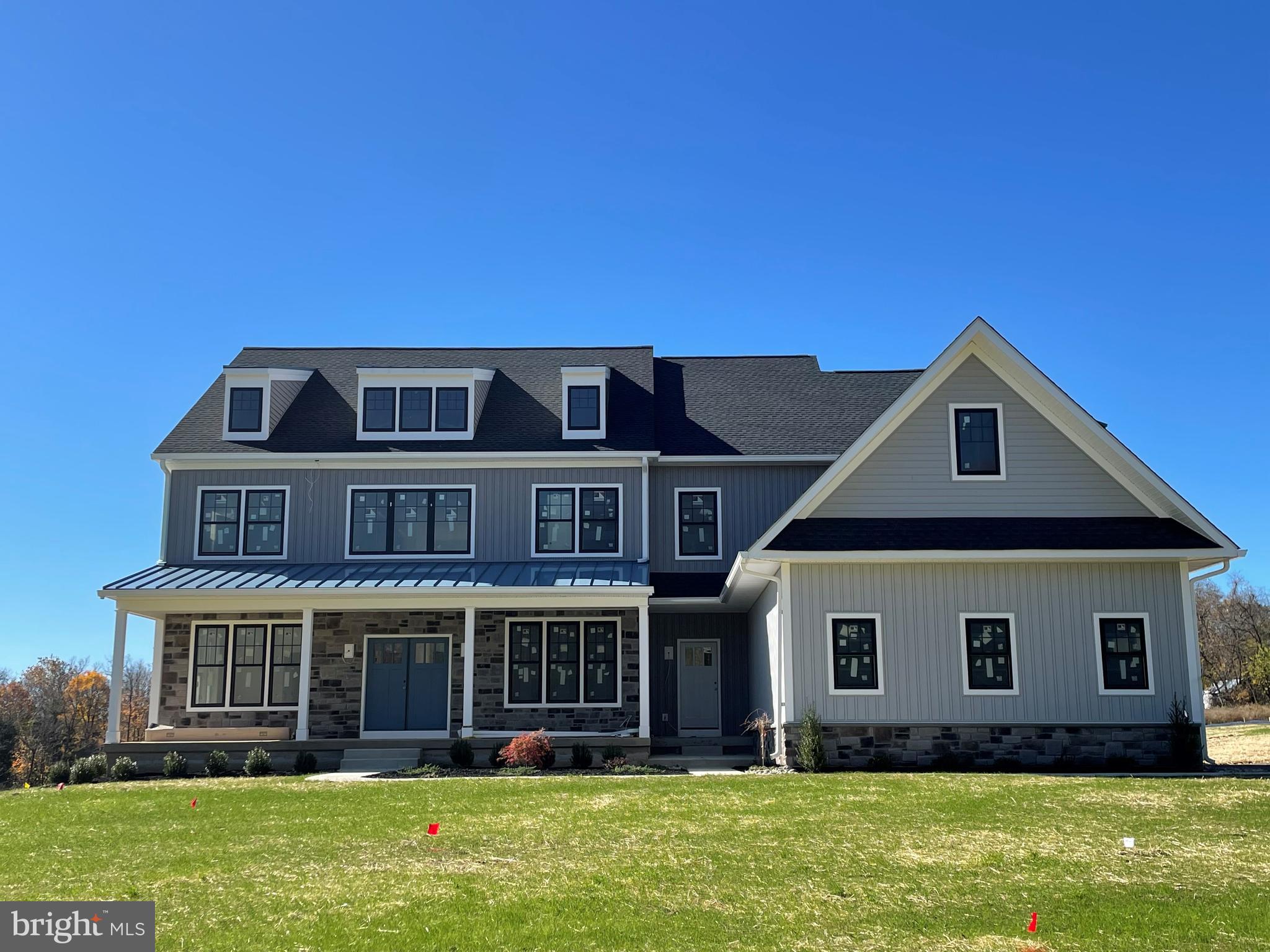 New construction without the wait! This 5 bedroom, 4.5 bath modern farmhouse is ready now for Buyers to customize and pick their finishings. The home is loaded with luxury standard features and appointments built by an experienced team of professionals committed to superior craftsmanship. With an astute attention to detail utilizing only quality materials befitting of luxury living, Corsini Custom Homes pride themselves on delivering a beautiful product for today’s modern lifestyles. The flexible open floor plan includes dramatic 9’ ceilings throughout the house and custom millwork. Buyers can pick their hardwood flooring that will grace the first floor, double staircases and second floor hallway. When you walk in the front door to the two-story open foyer, to the left is the first-floor owners suite with en suite that can be used as an office. To the right is the lovely dining room that includes custom crown molding and board and batten millwork. Buyers can customize their gourmet kitchen that will boast built-in furniture quality kitchen cabinets featuring adjustable shelves and soft-close drawers. The oversized island features an overhanging breakfast bar for seating. Buyers can pick their quartz or granite countertops. The kitchen features high end appliances including a 6-burner stainless gas range, built in microwave, double wall oven and a stainless refrigerator. A wood burning fireplace with farmhouse mantle warms the family room. Upon arriving on the second floor there are two adjacent bedrooms that share a Jack and Jill bathroom. Walk down the hall to the third bedroom with an en suite bath. The primary bedroom rounds out the second floor and includes a dramatic and beautiful bathroom with soaking tub, super shower and two water closets. In addition, there are two primary walk-in closets, a quiet sitting room and multiple areas for storage off the primary bedroom. The 3-car side entry garage is pre-wired for Electric Vehicle charging station. In addition, the house it is pre-wired for a generator, security & alarm systems, cable & internet. The basement includes recessed lighting and plumbing rough-in for Buyers to finish a full bath one day if they choose. The home has PUBLIC sewer, private water, and NO homeowner’s association. It is conveniently located near 611 and in the award-winning Central Bucks School District. 
Come visit the completed model home at 5366 Old Easton Road! Call the listing agent to schedule a private tour.