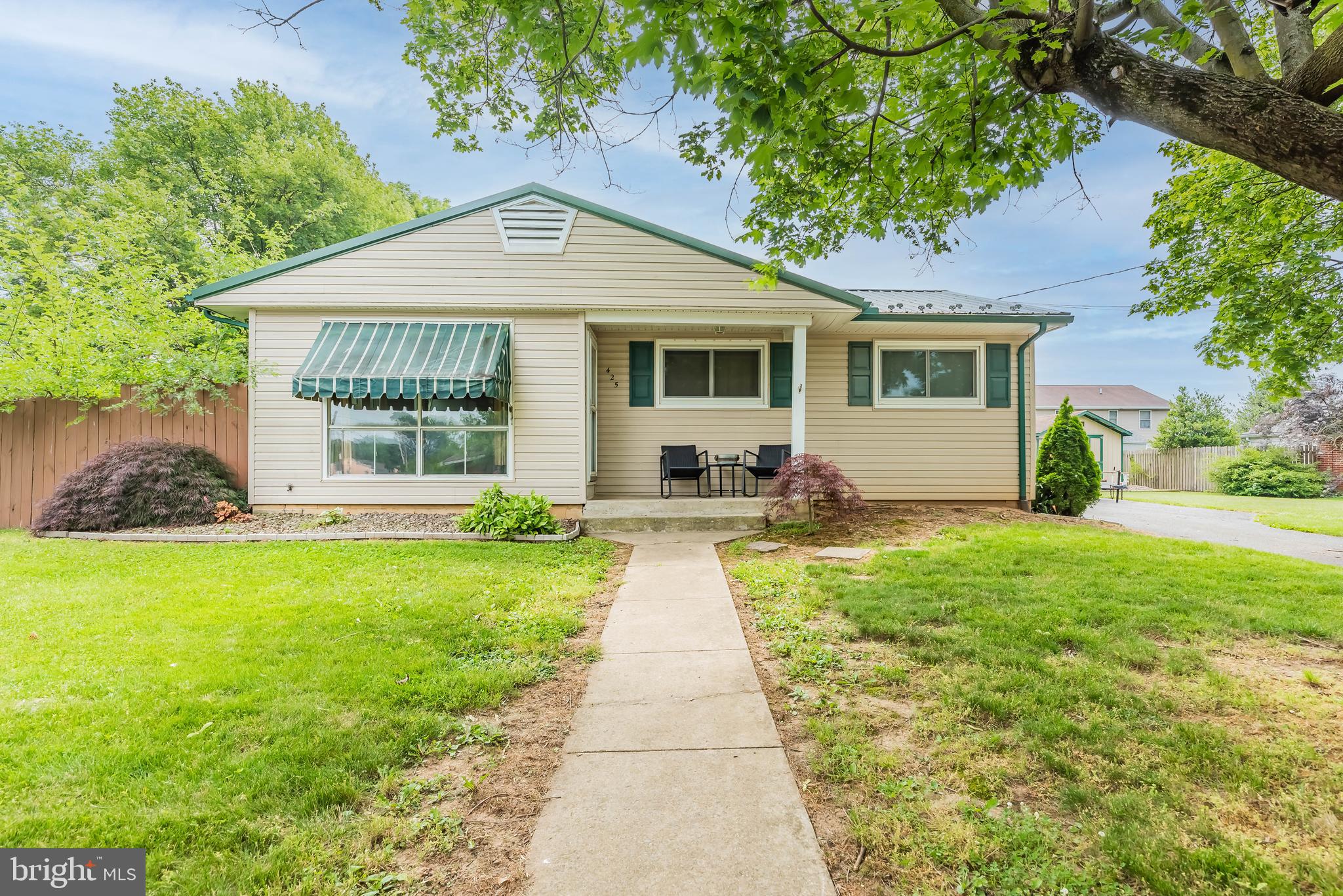 This super cute and cozy, ranch style home is ready for her new owner! Offering 3 bedrooms and 1 full bathroom, with a bathtub for those with little kiddos! :) Open floor plan combining the eat-in kitchen and living room! Full basement complete with 75% of finished living space. Unlimited possibilities! Great family room area that can be used for a 2nd living room, game room, kids play room, man cave, ect... whatever your needs are! Also offers another finished room that can be used for a 4th bedroom, office, crafting room, or even just extra storage! Plus - there's an unfinished area for utilities and plenty of room for even more storage! Interior amenities include hardwood floors, appliances, nice size bedrooms, extra closets/storage areas, and it's natural gas heat! Exterior amenities include a new metal roof with a transferable, lifetime warranty, replacement windows, fenced rear yard, rear deck, and storage sheds! This one is move-in ready, affordable and has a convenient location! Don't miss it! She won't last long! Call Kristin for more details and to schedule your own private tour!