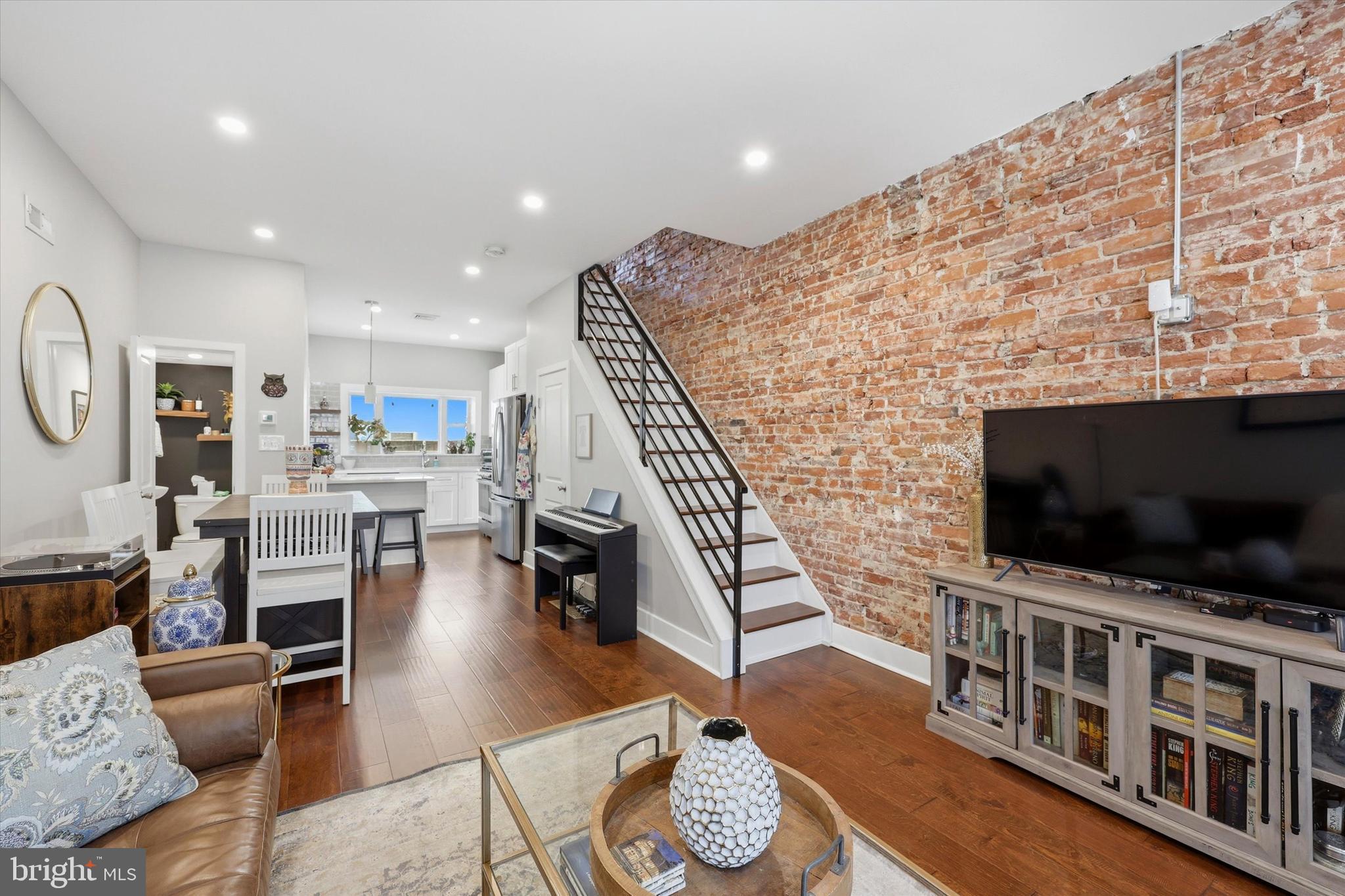 Beautifully Rehabbed 5 years ago, this home offers the perfect blend of modern finishes and city convenience. This 2-bedroom, 1.5-bath home features a wide-open floor plan filled with bright natural light, Exposed brick, complemented by recessed lighting and hardwood flooring throughout. The sleek eat-in kitchen, complete with quartz countertops, is designed for both style and functionality and flows seamlessly to a charming private yard—perfect for relaxing or entertaining. Upstairs, you’ll find generously sized bedrooms with ceiling fans for added comfort, and more exposed brick, while the partially finished basement provides additional multi-purpose space ideal for a home office, gym, media room, etc. Enjoy peace of mind with all newer finishes and mechanical systems, including central air—making this a truly turnkey home. Located just one block from the subway, and within walking distance to Marconi Park and the stadium district, with easy access to major highways, this location makes commuting and city living effortless. In Addition, this property has 5 years remaining on partial tax abatement, making it an opportunity you don’t want to miss!