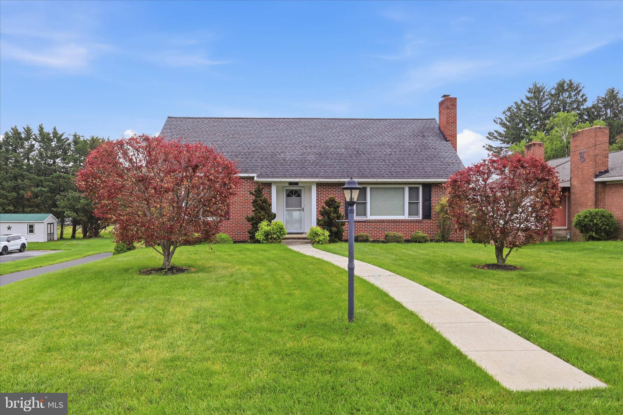 Kitchen remodeled in 2019, new oak cabinets, flooring and all new appliances; new anderson windows and doors; central air new  in 2021; roof 10 years old; hot water heater new in 2021; softner new in 2020; oak flooring through out; dining room with built in china closet; living room with triple front window, recessed lighting and fireplace (only used a couple time); foyer; large closets; pocket doors;  full floored attic with electric runned and framed ready to finish; basement with  new windows and separate heat; 1 car garage with opener; laundry area with lots of room for storage;  family room is carpeted; half bath; workshop area, and out side entrance.  Covered back porch overlooking back yard and the Clear Spring Park.  Great for children who could walk to school and to the Park.  Nesbitt Ave is right across from the schools.  Well maintained home!!