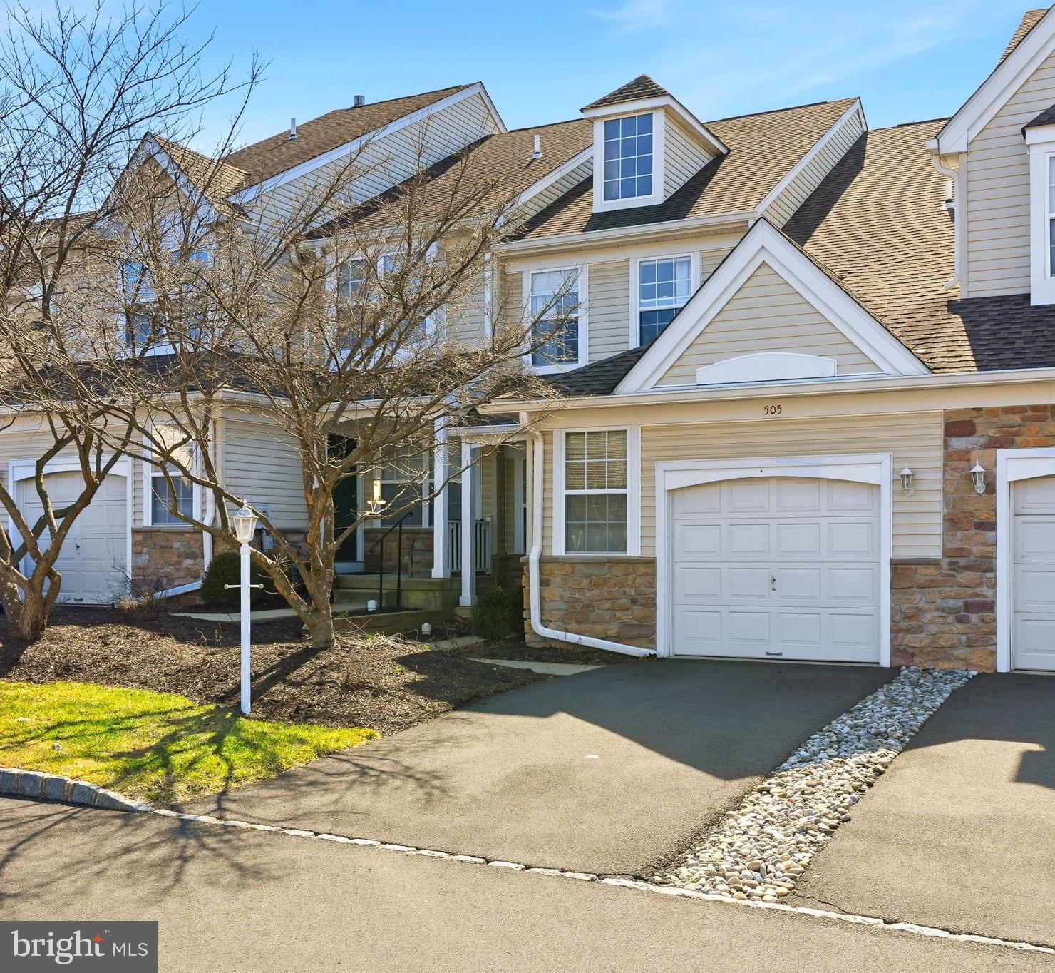 This well-appointed three-bedroom townhome offers abundant natural light and is conveniently located near New Hope Boro. The residence features rich hardwood flooring throughout and an updated kitchen with modern finishes, seamlessly connected to the family room, which includes a gas fireplace and access to an expansive composite deck with an awning. The spacious primary suite boasts a large walk-in closet and a bathroom equipped with dual vanities. The finished walk-out lower level provides versatile living space as well as excellent storage options. Located within the highly desired New Hope – Solebury school district and community of Wilshire Hunt, conveniently situated near the 202 corridor for commuting. Move-in ready and low maintenance living!