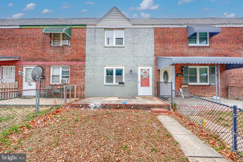 Freshly painted. Three bedroom, three finished levels, updated attached home in Brooklyn. Basement contains a powder room as well as side by side washer and dryer set. Contemporary open floor plan. Relaxing front porch. Fenced in back yard. House shows well.