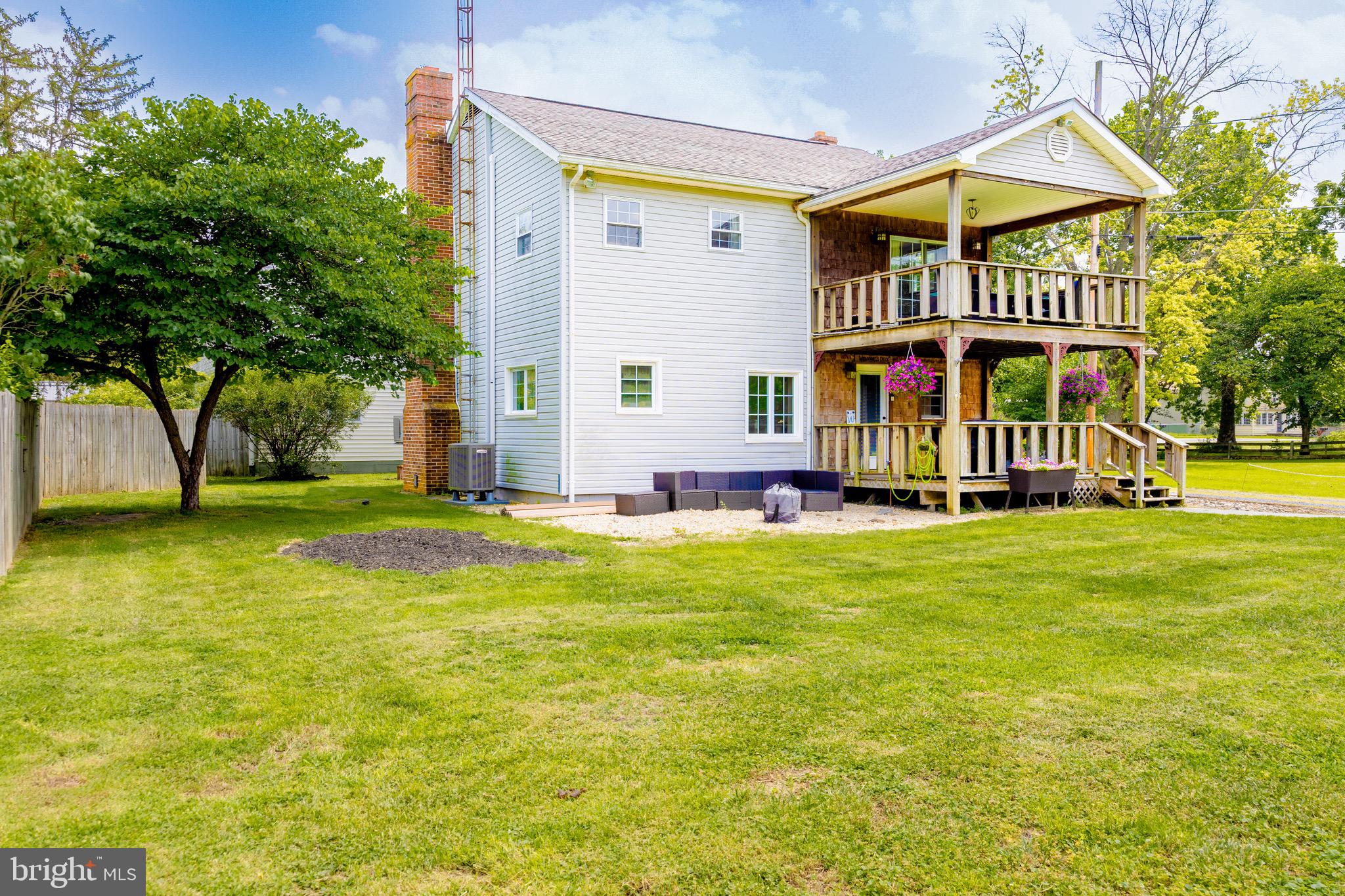 Experience the perfect blend of peaceful country living and everyday convenience in this charming Kearneysville home. Nestled on a spacious, level lot, this property offers plenty of room to enjoy the outdoors—whether you're hosting backyard BBQs, relaxing by the pool, gardening, or giving kids and pets ample space to play away from the concerns of a busy road. Car enthusiasts, hobbyists, and DIYers will appreciate the oversized detached garage, complete with a car lift that conveys with the property, providing exceptional space for projects, storage, or maintaining your vehicles. Enjoy the quiet, rural atmosphere while staying just minutes from grocery stores, restaurants, local bars, shopping, and the nearby communities of Ranson, Charles Town, Harpers Ferry, Inwood, and Martinsburg. Major commuter routes are also within easy reach, making travel to surrounding areas simple and convenient. If you've been searching for a home that offers room to spread out, a peaceful setting, and the convenience of nearby amenities, this Kearneysville property is ready to welcome you home! Schedule your private tour today!