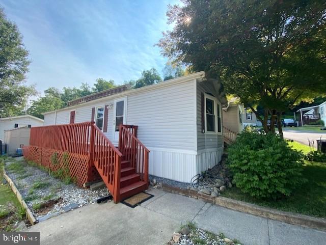 Why rent when you can own? This affordable 2-bedroom, 1-bath home is located in a small, privately owned manufactured home community in desirable Williams Township, where homes rarely become available. The home features low-maintenance vinyl siding, replacement windows, central air conditioning, forced hot air heat, a spacious eat-in kitchen, and a whole-house generator for added peace of mind. Relax outdoors on the wood deck complete with a Sunsetter awning while enjoying beautiful evening sunsets. The community offers an exceptional location just minutes from Route 78, with endless fishing opportunities directly across the street and Wy-Hit-Tuk Park nearby, featuring scenic walking trails, bike paths, and abundant outdoor recreation. Affordable lot rent of just $500 per month includes water and sewer, and the park owner provides snow plowing of the community street. Park approval is required, including a clean background check. One dog is permitted (under 50 pounds and a non-aggressive breed). An excellent opportunity to enjoy affordable homeownership in a peaceful, well-maintained community.