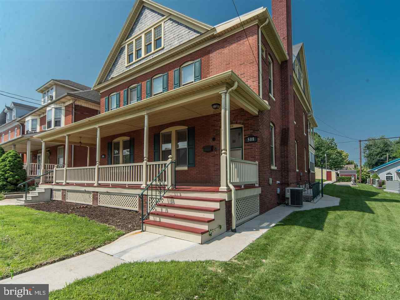 Totally remodeled!  Huge brick home w/beautifully refinished hardwood floors & new carpet.  Remodeled baths.  Tons of cabinet space, granite counters & new stainless appliances.  Sunroom w/laminate floor & wood ceiling.  Formal Dining.  4 spacious BRs.  Balcony & large front porch.  Basement & full attic could be finished for even more space! Gas heat/Central Air