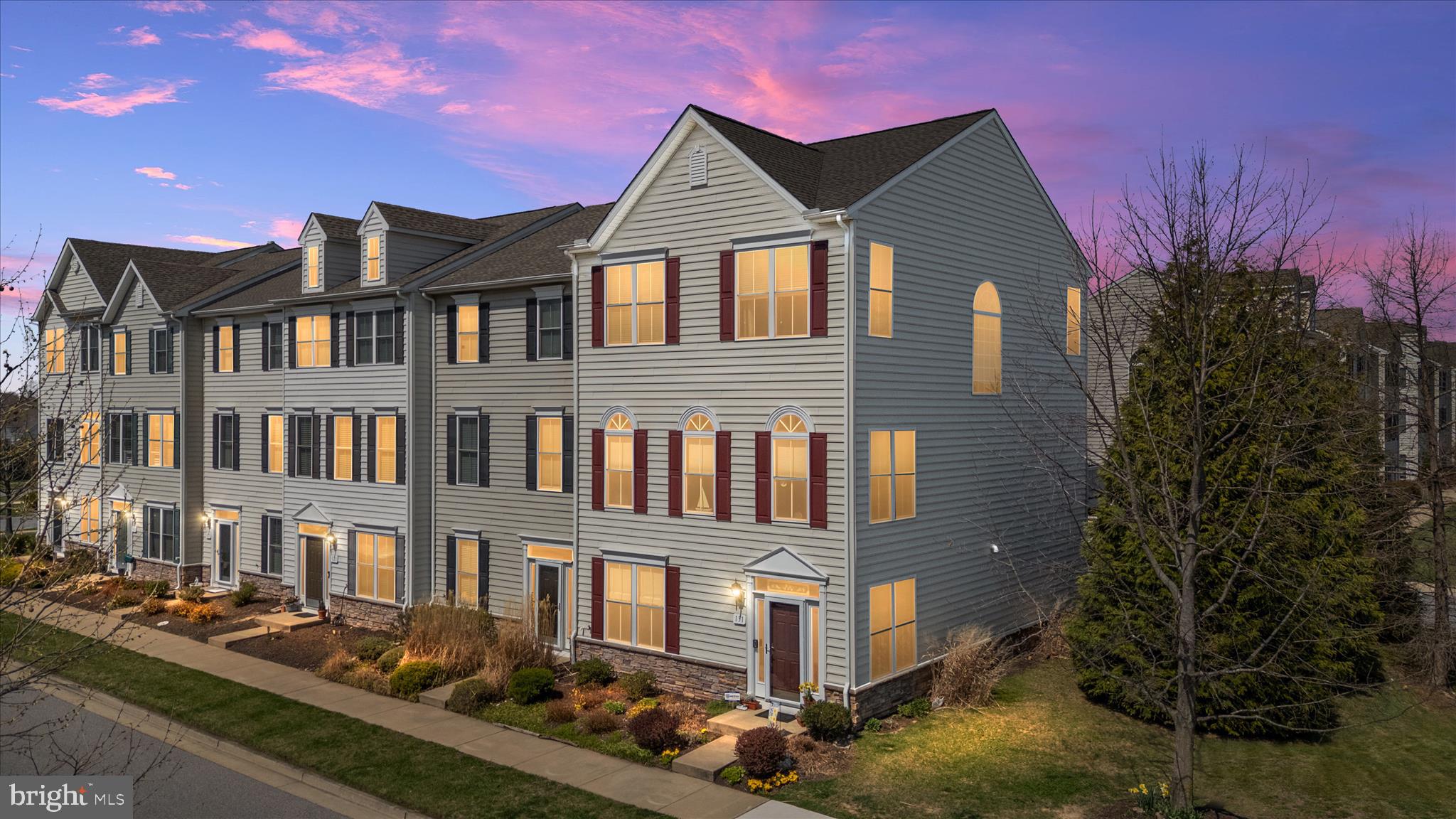 OPEN HOUSE SAT 6/6 10am-12pm!! Meticulously maintained by the original owners, this beautifully UPGRADED End-unit Townhome offers 3 finished levels totaling 2300sqft, a 2-car garage, and Rarely found DUAL Primary Suites—each featuring a spa-inspired bath with soaking tub, separate shower, ceramic tile floors & surrounds, and expansive walk-in closets. The versatile entry-level flex space provides an easy option for a private 3rd bedroom (written quote available), office or living room & features hardwood floors & a powder room. Venture up the Oak hardwood staircase to the Open-concept main level, showcasing gleaming hardwood floors in the Great room with corner fireplace that flows seamlessly into the Gourmet kitchen. Highlights include: 42” maple glazed cabinets with soft-close doors and drawers, under and over cabinet lighting, Granite countertops, Stainless steel appliances, Double wall ovens, Gas cooktop, 12x12 Ceramic Tile floors, Lighted pantry, Upgraded Trim package, plus a two-tier island with seating and a separate dining area. Step outside to the 12x20 Trex deck complete w/ propane line for your Grill & outdoor speakers making it perfect for entertaining on these upcoming Summer nights! The upper level features dual primary suites, including a front bedroom with vaulted ceiling and exceptional space throughout & Full size Laundry room w/ Front loading washer/dryer. Additional features include: Brand NEW Roof, central vacuum, whole-house audio throughout main living areas, bedrooms & deck, whole-house humidifier, ceiling fans, brushed nickel fixtures, utility sink rough-ins (laundry and garage), custom garage shelving, and kayak storage under the deck. Thoughtfully landscaped perennial gardens provide color year after year and is just another example of the love that was poured into designing this home! Enjoy an amenity-rich community with pool, clubhouse, and floating dock/pier with access to Thompson Creek. Ideally located just minutes to the Chesapeake Bay Bridge for an easy commute and convenient access on and off the Shore. Don’t forget to Check out the 3D iGuide Tour!