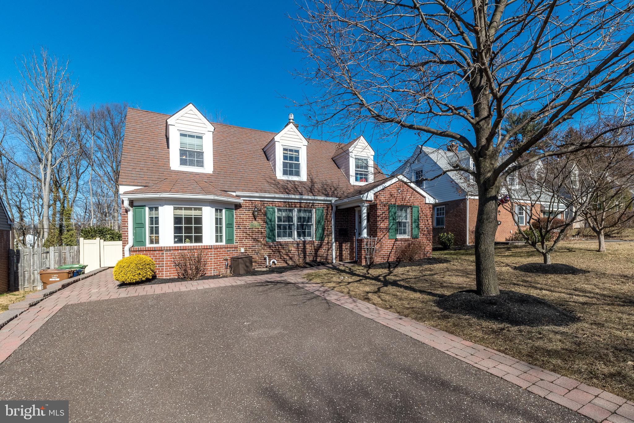 Prepare to be surprised from the moment you walk through the front door of this exciting 4 Bedroom, 2.5 Bath home with outstanding renovations, additions & upgrades, WITHIN WALKING DISTANCE TO THE TOWN OF AMBLER and directly across from a township park. You will be amazed at the custom designed, beautifully updated interior that perfectly blends charm with practicality. All of the details, including many hidden gems, have been professionally and thoughtfully integrated into the design. Tiled & hardwood floors, high-end designer light fixtures, custom millwork and an abundance of recessed lighting are just the tip of the iceberg. The entrance vestibule addition features bench seating w/storage, cubbies, cabinets & coat hooks. This area opens to the completely recreated space including an outstanding Gourmet Kitchen opening to a versatile room with built-in bench seating that could serve as a Living or Dining Room or Playroom, with bar including quartz counter, wine rack & space for wine fridge. The chef’s Kitchen is an absolute masterpiece worthy of a multi-million-dollar house, featuring quartz counters, tiled backsplash, double Bosch wall ovens, island w/seating for 3 plus pull-out extension to seat more, new electric cooktop, decorative glass cabinets, instant hot/cold plus reverse osmosis, Bosch dishwasher, new refrig, all open to the Bar. The Breakfast Area includes a custom granite table, built-in bench seating & hidden storage cabinetry. The adjacent Butler’s Pantry features a quartz counter, custom cabinetry & a fantastic walk-in pantry closet. The 1st Floor Office includes a built-in desk w/granite perimeter shelving. The stunning updated Powder Rm includes a coffered ceiling, vanity w/stone counter & vessel sink. Relax or Entertain in the absolutely sensational Family Rm (added 2006- renovated in 2016) with tray ceiling, gorgeous, wide, electric fireplace, custom built-in cabinets, designer wall sconces, & a sliding French door from this room leads to the exterior. Stairs with hardwood treads include oversized lower steps to add extra seating to the Living Room. The 2nd floor hall includes a redesigned space for the included washer & dryer plus more custom cabinetry. The luxurious Main Bedroom addition features a vaulted ceiling & atrium window, with a professionally organized closet. The upgraded Main Bath includes a vanity w/dual sinks & stall shower w/tiled surround & new frameless glass door. The 2nd Bedroom has a custom built-in desk w/quartz counter. Bedrm 3 has a fantastic Murphy-Bed w/custom surround lighting when open & custom millwork when closed. A built-in bench w/storage accents the dormer window. Bedroom 4 features a closet & 2 storage areas, & all bedrooms offer ceiling fans. The Full Hall Bath includes a new vanity w/quartz counter & a soaking tub w/shower. Continue into the custom designed Lower Level featuring a Recreation Rm you won’t want to leave. This space was completely renovated in 2019 and features a lighted ceiling that changes colors, a gas fireplace w/stand-alone glass-tiled surround & marble hearth, custom bar w/quartz counter & space for wine fridge, mural-painted, camouflaged closets w/extensive storage shelving and mirrored wall. The adjoining heated Gym offers an egress window. Other special features include 2 zones of HVAC & a tankless hot water heater. The excitement continues in the fenced rear yard, where the heated, covered Patio includes pull-down canvas walls to allow for an all-year-round retreat. The paver patio w/new fan overlooks the rear yard which includes a firepit & a large renovated Shed (2025). The driveway can fit 4 cars. Walk down street to play in the Park, or walk into the vibrant town of Ambler to see a movie, eat at one of many terrific restaurants, shop, or take the train to center city Phila. Don’t miss your chance to own this hidden Gem within highly rated Upper Dublin School District.