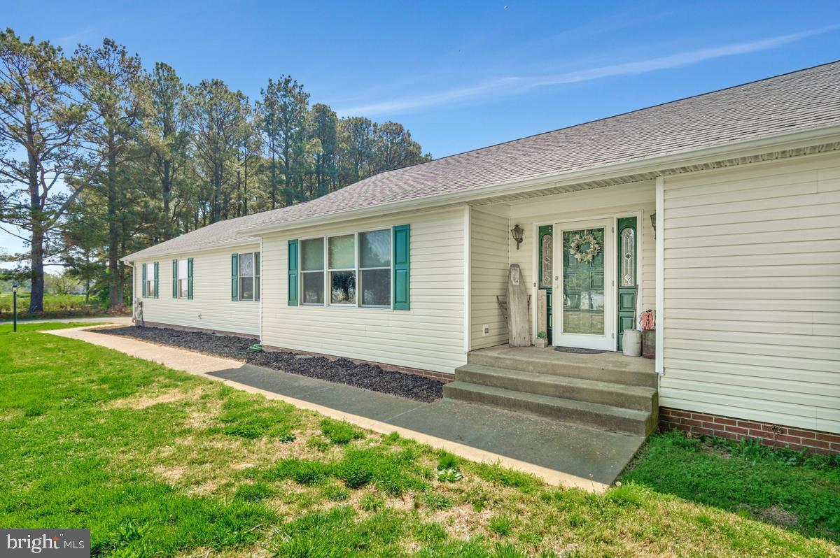 WATERFRONT for Days!!! Do you LOVE the Chesapeake Bay, but hate the tides and waves? Do you love Solomon's Island, but hate the summer crowds? Do you love a private home, but want to get to great shopping & restaurants? Then THIS IS YOUR HOME!! 
Nestled along the serene shores of St. Jerome Creek, this spacious ranch home offers a rare opportunity to own a waterfront retreat with truly unmatched, 360-degree water views from nearly every window. Solidly built with “great bones,” this home is ready for your personal touch—an ideal canvas for your HGTV-inspired renovation and instant sweat equity. Designed for easy main-level living, the home features three generously sized bedrooms and two and a half baths, along with a spacious layout that maximizes both comfort and those breathtaking creek views. An expansive attic provides excellent storage, while the attached two-car garage adds everyday convenience. Adding even more value and versatility, an additional detached garage—approximately 800 square feet—sits just behind the main residence. With minimal effort, it could be restored into a charming accessory dwelling unit, perfect for rental income, guest accommodations, or a private retreat. Outside, the lifestyle truly shines. Embrace laid-back waterfront living with your own private pier—ideal for fishing, crabbing, and kayaking. A storage shed keeps all your gear organized, while a detached garage has been transformed into a relaxed summer hangout space. Whether you're enjoying quiet mornings on the water or entertaining by the creek, this property delivers the very best of Southern Maryland living.