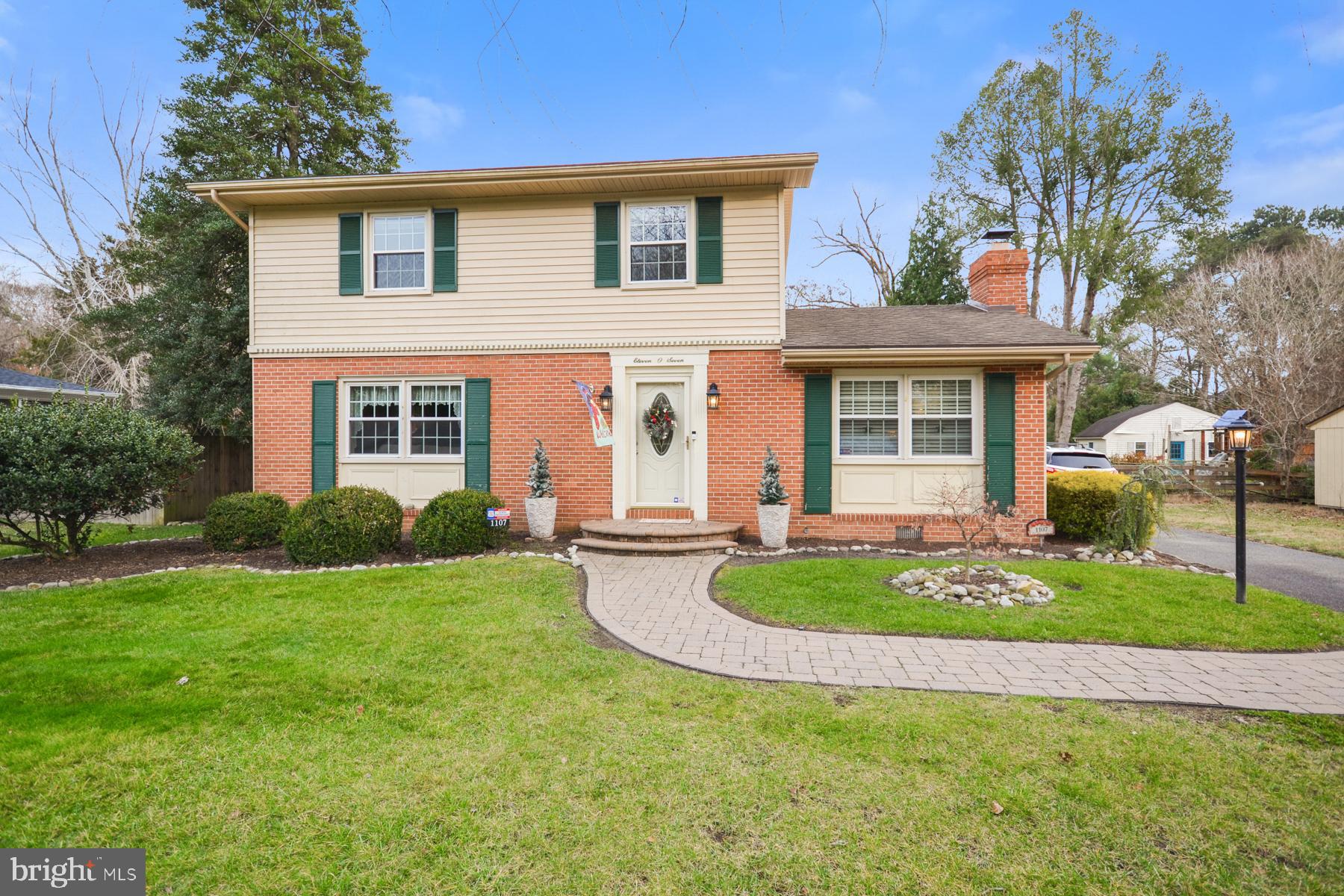 Enjoy low taxes and no HOA fees? How about enjoying Salisbury services without paying city taxes? Welcome home to 1107 Frederick Ave!

This stately home boasts a classic design featuring a large living room with a fireplace, a functional kitchen with updated appliances, and a dining room spacious enough to accommodate the whole crew—perfect for those Sunday suppers! You'll also find a large family room ideal for catching the game, along with three oversized bedrooms. The bathroom has been updated with a modern vanity, fixtures, flooring, and commode.

This home is extremely well-maintained, with updated flooring and carpets and a newer HVAC system.
The bonus feature is the sunroom, which adds to the home's square footage and leads to the private, park-like fenced backyard. The mature landscaping and award-winning hardscaping frame the concrete pool, creating a serene setting that’s perfect for entertaining!

Additional features include two fireplaces, two sheds, and a well for all outside water use, including the pool and irrigation.

A large storage shed offers space for all your toys, and there’s plenty of off-street parking.

1107 Frederick Avenue is ready for you to enjoy today—just in time to plan for summer 2025 by the pool!