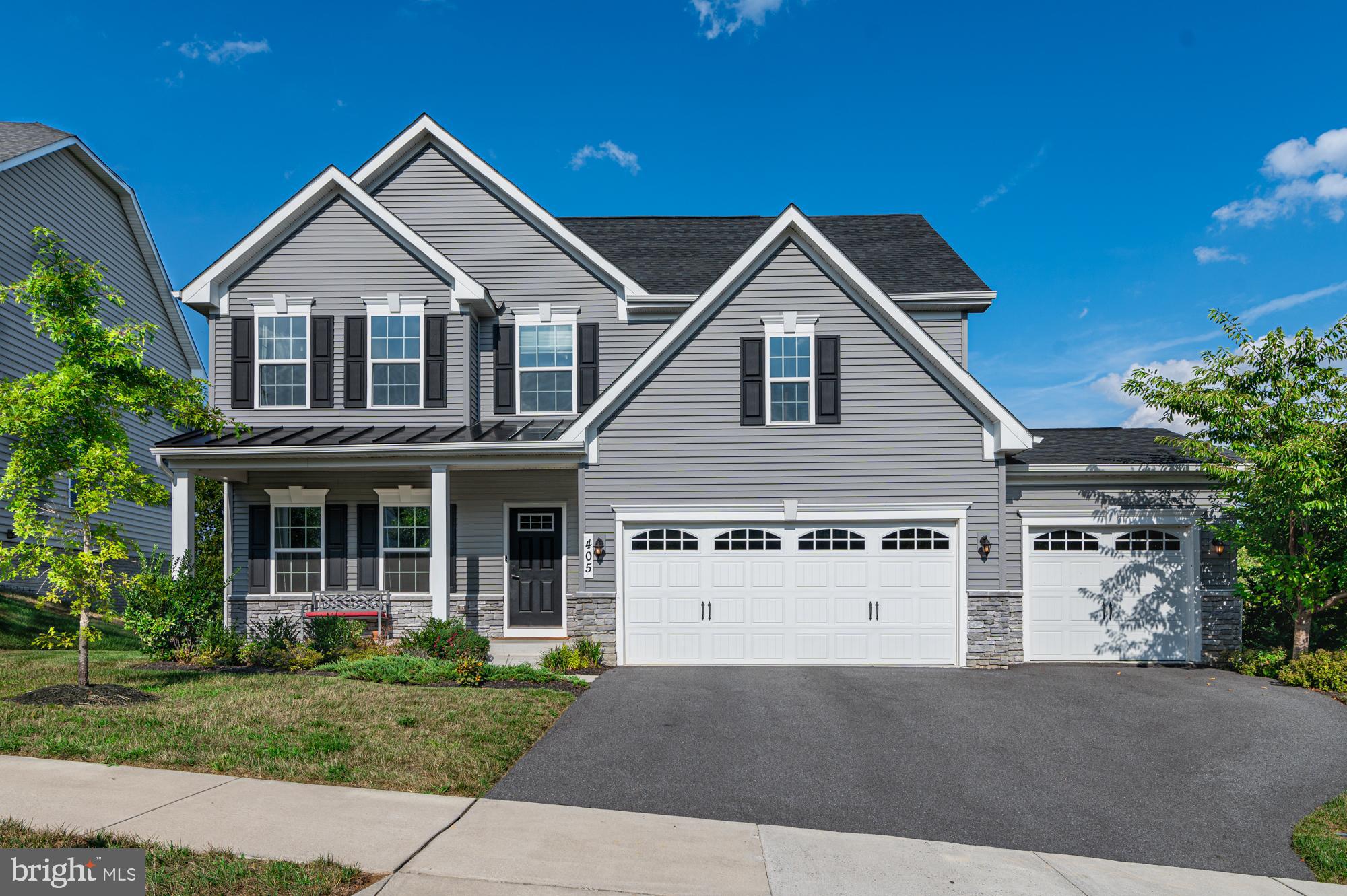 Don’t miss this beautifully upgraded Genoa model, ideally set on a wooded lot in desirable Brunswick Crossing and offering a sought-after main-level primary suite, 3-car garage, and exceptional living space throughout. Gorgeous hardwood floors extend across the entire main level, where natural light filters beautifully through the trees and creates a warm, inviting atmosphere from the moment you enter. With its private, leafy views and elevated setting, this home truly feels like a treehouse retreat.

Thoughtful custom details are found throughout, including updated light fixtures, refreshed kitchen and bath hardware, and fresh paint. The gourmet kitchen features white cabinetry, upgraded GE stainless steel appliances, and a sleek convection range. A large center island opens seamlessly to the spacious family room and sunny morning room, with access to the expansive 12x20 Trex deck overlooking the lush wooded backdrop. The formal dining room provides wonderful space for holiday gatherings, while also offering flexibility as a main-level office. The serene primary bedroom suite offers a view of trees through its many windows, a lovely bath and large walk-in closet.  A practical mudroom and laundry room complete the main level.

Upstairs, you’ll find three generously sized bedrooms, including the bonus bedroom upgrade that comes with the 3-car garage version of this home, along with a large loft space perfect for a second family room, teen hangout, or additional work-from-home area. Cat5 outlets are located throughout the home.

The Genoa model is known for its depth and width, and this home’s basement delivers with over 1,600 square feet of additional space. The bright and spacious rec room features patio doors leading to the private backyard, along with a full bath and two additional rooms ready to be finished to suit your needs—media room, office, hobby room, guest space, or more. A concept hardscape and a second deck concept virtual rendering have been included in the photos to help showcase the possibilities for maximum enjoyment of this serene backyard setting. 

Come experience all that Brunswick Crossing has to offer—a true staycation lifestyle with resort-style pool, tennis, fitness center, beach volleyball, soccer field, miles of walking trails woven throughout the community, a community garden, and more. The Marketplace is well underway, with a grocery store and several restaurants already in place. Brunswick also offers a MARC train station less than a mile away, plus convenient commuter routes to Frederick, Washington, D.C., and Baltimore.

Enjoy the natural beauty and recreation of the C&O Canal, Harpers Ferry National Historical Park, and nearby wineries, all just a short drive away. This beautifully upgraded home offers space, privacy, convenience, and an exceptional community lifestyle—come make it yours before someone else does!