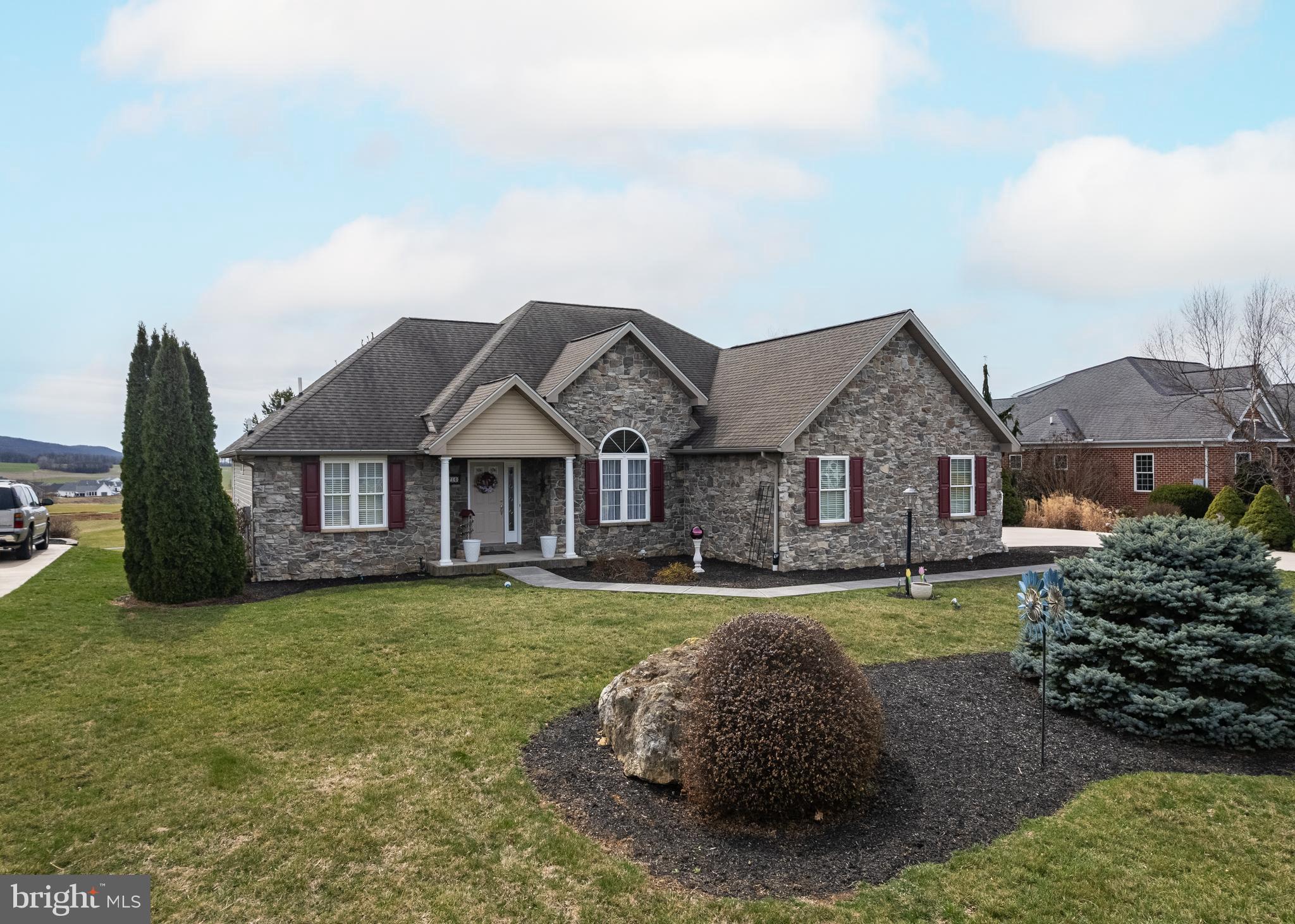 Golf course living at it's finest! This beautiful custom built home has been lovingly maintained by the original owners. It is surrounded by breathtaking farmland and mountain views and backs to the 4th tee at the Penn National's highly rated Iron Forge golf course. Imagine being able to watch golfers all day long while you relax on your deck. The home features a total of 3 bedrooms, each with full baths and an office (currently with pocket double glass doors) which could be converted to a fourth bedroom if need be. Everything you need is on the main level however, it has a full walk out partially finished basement with a large recreation room, 2nd gas fireplace, and the 3rd bed/bath also with walk in closet. The remainder of the basement can be used as storage, work shop, etc. And features a double door rear entrance for tractor, golf accessories, or large equipment.