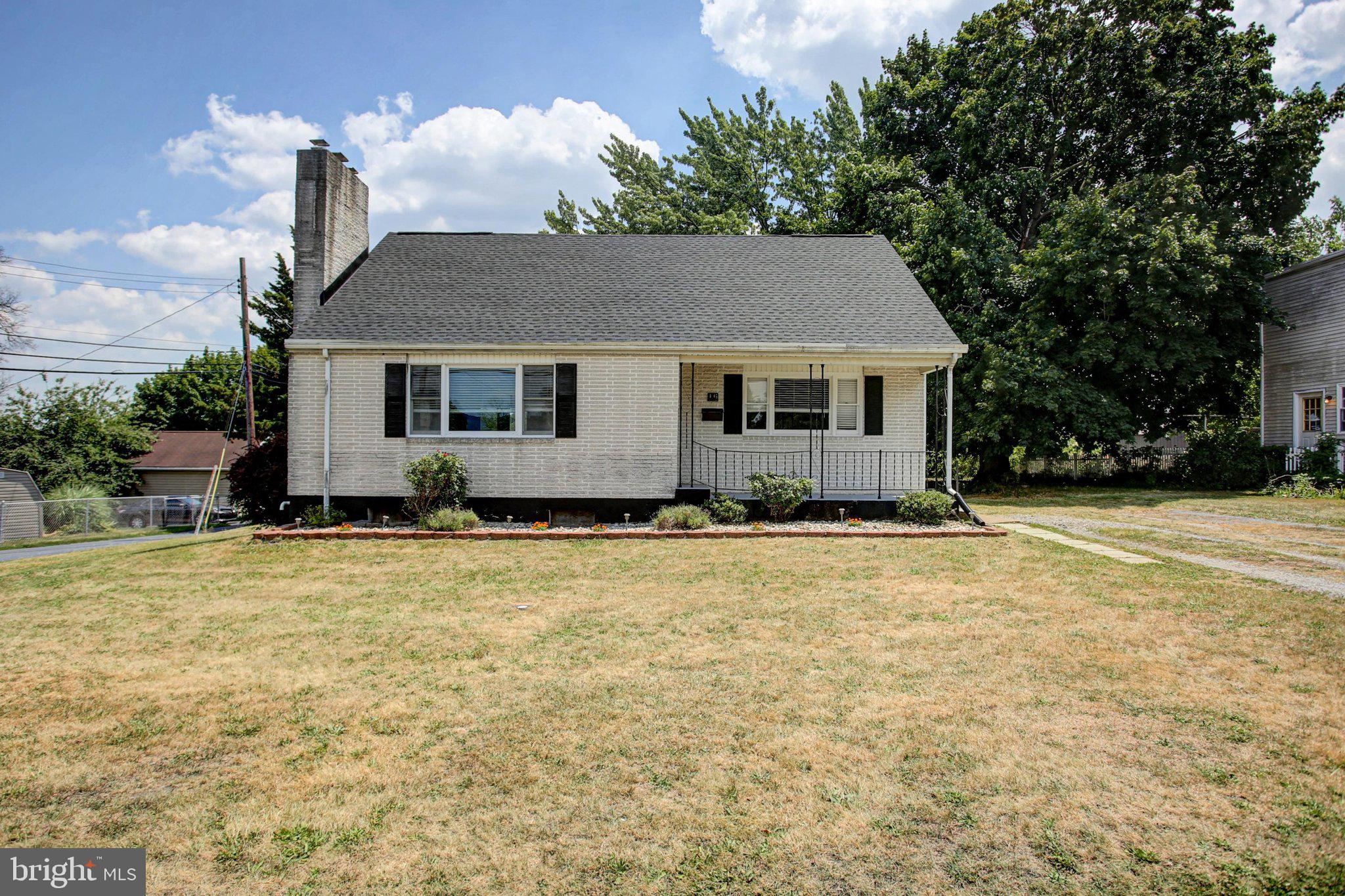 Welcome home to 16 East Beale Avenue! This beautifully updated, move-in ready 3-bedroom, 2-full-bath Cape Cod in Enola offers the perfect blend of modern comfort and unbeatable convenience.
Step inside to a bright, wide-open floor plan where the living room, dining area, and kitchen flow seamlessly together. The inviting living room features a cozy natural gas fireplace and a large triple window that floods the space with natural light. The chef-ready kitchen is an entertainer's dream, boasting a spacious island with a breakfast bar, recessed and pendant lighting, stainless steel appliances, and plenty of workspace. The adjacent dining area—complete with a charming built-in corner cupboard and an updated 3-light chandelier—opens directly to the rear deck, making indoor-outdoor dining a breeze.
The flexible main level also includes a comfortable bedroom, a full bathroom, and a separate family room. Upstairs, you’ll find two additional generously sized bedrooms, both featuring spacious walk-in closets. The second-floor full bath is designed for busy mornings, equipped with a tub/shower enclosure and a double sink vanity. All appliances will convey in the sale Washer , Dryer, Refrigerator Range, Microwave.
Peace of mind comes standard here with a brand-new roof installed this year, efficient natural gas forced air heat, and central A/C was replaced in 2018 and new deck in 2020. The massive basement offers endless possibilities for storage, a workshop, or future finished space. Outside, enjoy peaceful, quiet evenings on your private deck overlooking a flat backyard with a handy storage shed.  This home also has a radon mitigation system installed.  The flat lot has kid's swing set and a storage shed.
Location is everything! You are just minutes from I-81, Routes 11/15, and a quick 5-minute drive into Harrisburg. Quick possession is available, so don't wait—schedule your tour today before this one is gone!