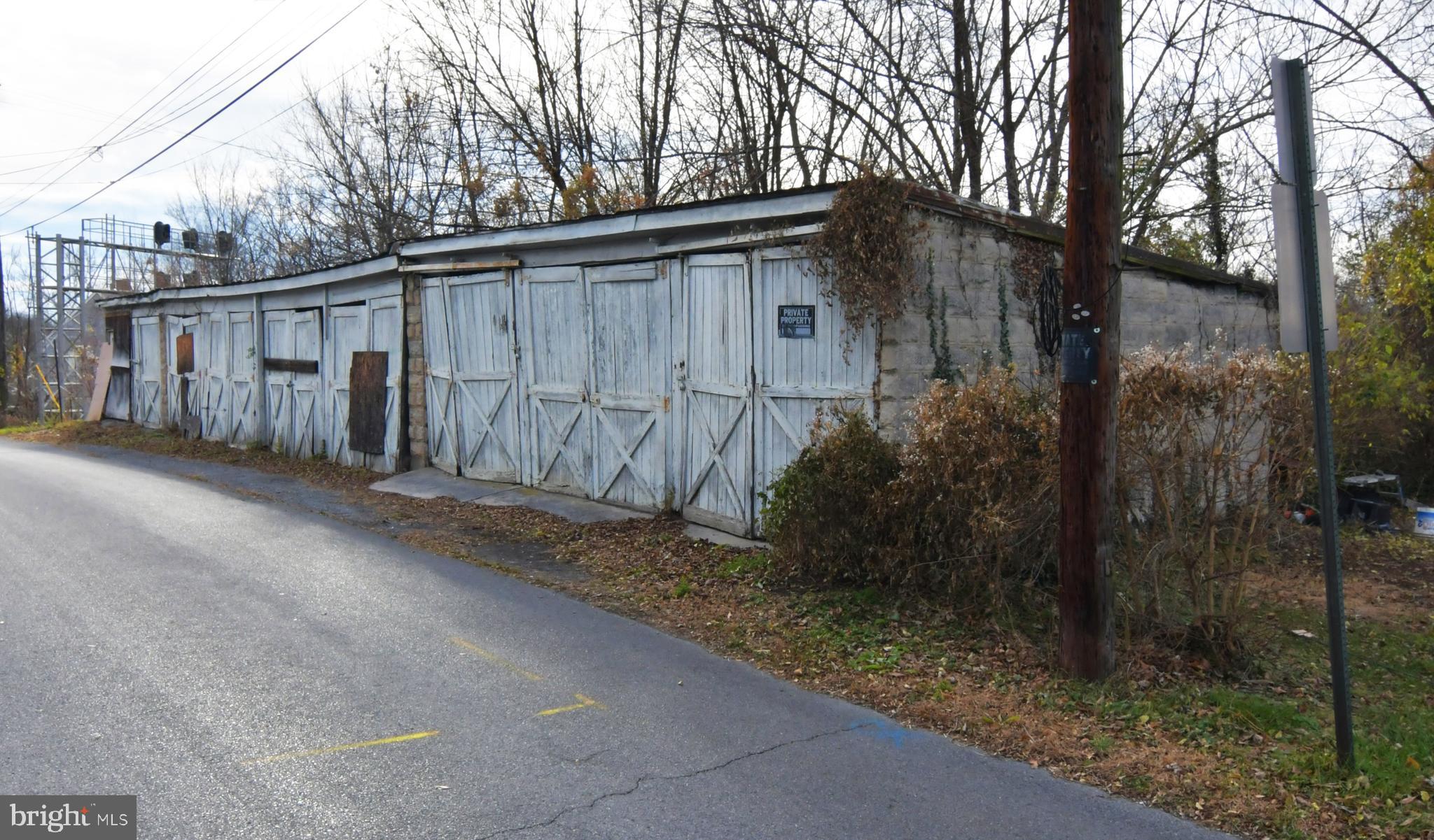 EASILY AFFORDABLE! Near downtown Martinsburg and convenient to I-81. Four lot numbers totaling .35 acre with existing storage buildings, parking area. Sold strictly as-is, where is. Cash only. Buyer responsible for verifying water and sewer availability and whether lot is suitable for buyer's intended use. Per the City of Martinsburg, water and sewer are available to serve the property. May be subject to tap fees. Also, may be subject to new impact fees for houses, multi-family and mobile homes that must be paid before a building permit is issued. The Eastern Panhandle is one of the fastest growing areas of West Virginia.  Residents of Martinsburg and Berkeley County are attracted to the small-town atmosphere, employment opportunities, restaurants, shopping, services, medical facilities, a revitalizing downtown, and access to major roads, the MARC train and Amtrack. Lot sizes approximate. Tax ID numbers for Lots 6 & 7 06 0015001500000000, for Lots 8 & 9 06 150014000000000.  Assessment and taxes reflect total for all the lots.  Cash only - proof of funds required.