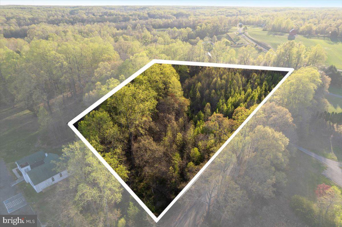 Fantastic 3 acre lot on quiet road in Southern Prince Georges County Horse and Farm country.   Lot has not been perced but all around are houses so hopefully the lot will have no problem percing.  Lot is flat and deep enough to have a private setting with plenty of space for your next dream home.  Owner is flexible and ready to make a deal.