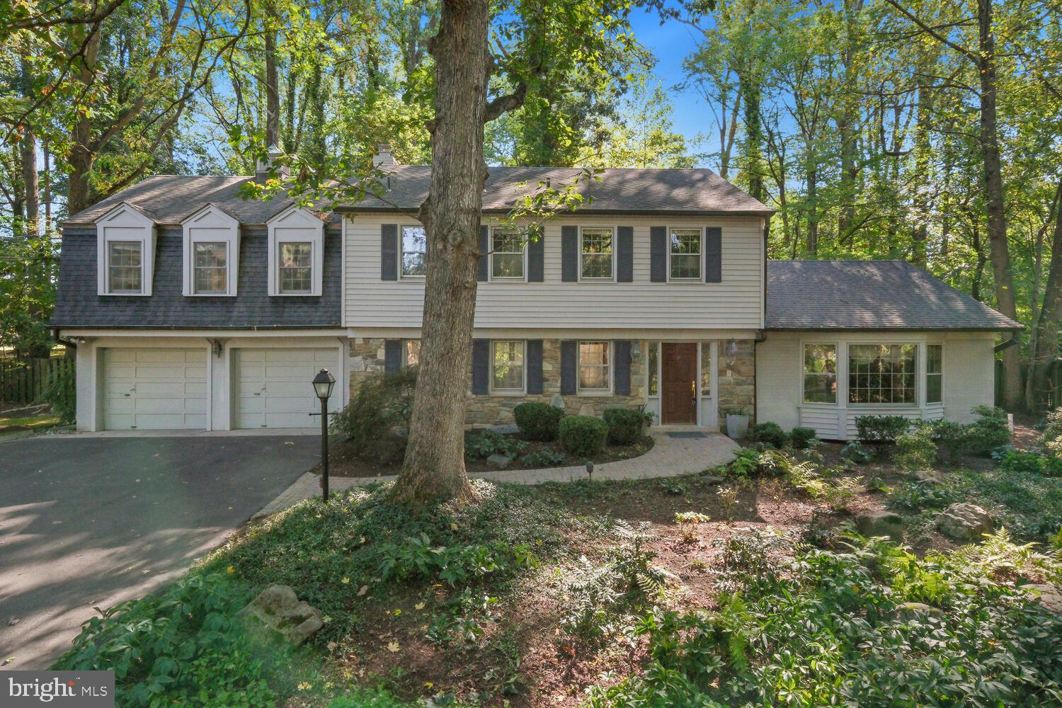 Welcome to 11313 Marcliff Road, a stunning stone-front colonial nestled in the highly sought-after Luxmanor community.

Set on a spacious, maintenance-free 0.65-acre lot, this elegant home offers five bedrooms and four and a half baths, seamlessly blending style, comfort, and modern convenience.

The bright, airy kitchen is flooded with natural light from skylights and expansive windows that frame scenic views of the surrounding landscape. It features top-of-the-line GE and KitchenAid appliances, perfect for any chef. The impressive primary suite addition boasts floor-to-ceiling windows and a luxurious ensuite bathroom, while custom built-in cabinetry enhances the storage in most bedrooms and the dining room.

The fully finished basement is perfect for entertaining, with a large recreation room, a well-equipped bar area, and an additional room with a full bath. Meticulously maintained, the home offers two separate heating and cooling zones for optimal comfort year-round.

Outside, the private backyard retreat includes a large stone patio, basketball court, and an invisible deer fence, making it an ideal space for relaxation and outdoor gatherings.

Ideally located near Tilden Woods Park, Tilden Woods Pool, and North Farm Pool, with easy access to I-270, I-495, Route 355, and the North Bethesda Metro Station, this residence offers unparalleled convenience. For entertainment, dining, and shopping, Pike & Rose, Montgomery Mall, and the Strathmore Music Center are just minutes away. Schedule your private tour today to discover the exceptional lifestyle that awaits in this remarkable home.