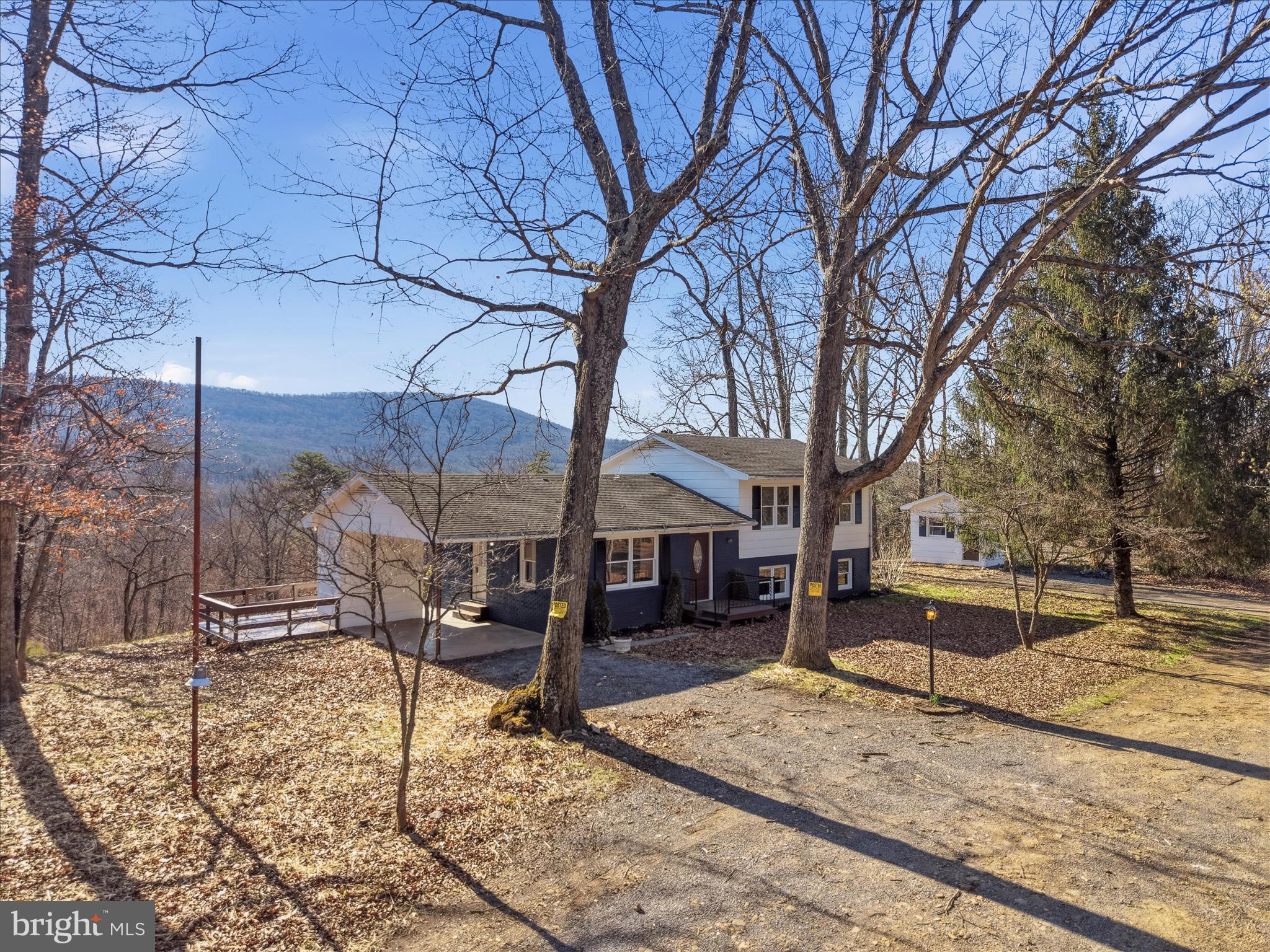 If you have ever dreamed of a property with NO HOA in wild wonderful West Virginia this is your lucky day!  34.775 Unrestricted acres to spread your wings...  Maybe a family compound is what you have in mind, or a quiet country retreat where you can hunt or ride ATV's...  This home was MADE for large groups.  with 4 finished levels, newly screened in back porch for bird watching or gazing at the majestic mountain views... The sweetest thing ever is the "canning" room build on the carport...  This home is calling for a simpler slower pace, Come and grow your own produce, raise a few animals too!