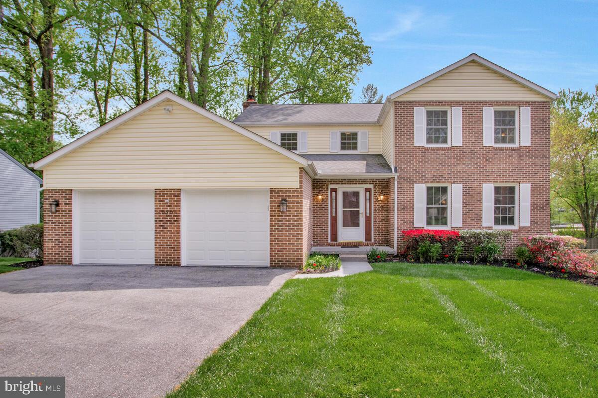 This stunning Burleigh Manor home is in prime condition & ready for a lucky buyer to settle in to this ideal community close to top rated schools, Centennial Park with lake & walking paths and incredible Ellicott City & Columbia amenities! The impressive 2 story open foyer is a great way to greet your guests and the easy flowing floor plan is perfect for daily living & hosting gatherings too with: formal living & dining rooms; an eat in kitchen & generously sized adjoining family room with cozy gas fireplace; convenient main level laundry / mudroom; and an oversized 2 car garage.  Handsome hardwood flooring stretches across most of the main & upper levels! You will find four bedrooms all with custom closet organizers & ceiling fans and two remodeled baths upstairs. The walkout lower level offers a recreation room & full bath, large cedar closet + plenty of unfinished space for storage & hobbies. Enjoy spending hours relaxing on the expansive rear deck with both covered & open areas plus steps to the manicured yard; there is even a secure shed under the deck for yard tools &  bikes. This loved residence has been thoughtfully maintained & upgraded: new heating & cooling system 2018, garage door replacement 2017, kitchen appliances 2017, gas water heater 2016, Pella replacement windows 2010, roof/siding/gutters 2009. What a great time of year to buy & move into this exceptional home.