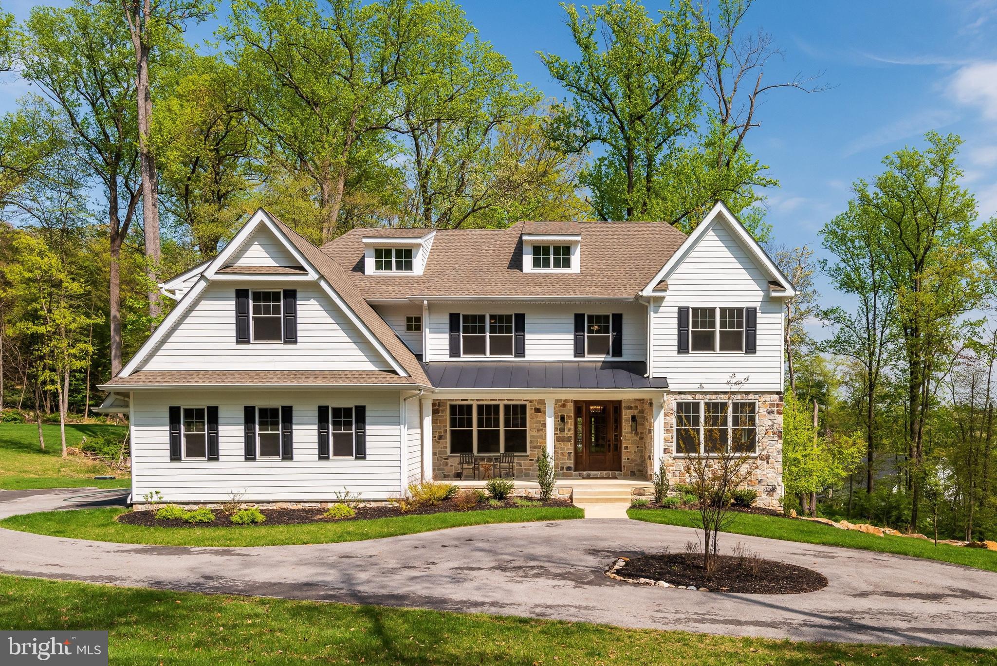 Welcome to 2085 Diamond Rock Road, a beautifully appointed 5-bedroom, 3.5-bath home located in the highly sought-after Tredyffrin-Easttown area. Set on a private, picturesque lot, this residence offers a seamless blend of timeless style, comfortable living, and exceptional space. Designed with both everyday living and entertaining in mind, the main level features a beautiful formal dining room, elegant living room, and a dedicated office ideal for working from home. The spacious kitchen serves as the centerpiece of the home, complete with granite countertops, stainless steel appliances, a large center island, and a charming dry bar/coffee nook. Just beyond the kitchen and dining area, the expansive family room offers an inviting gathering space with direct access to the oversized back deck overlooking the peaceful backyard and surrounding trees. A generously sized mudroom and powder room add convenience and functionality to the first floor. Upstairs, the impressive primary suite provides a relaxing retreat with two walk-in closets, including one oversized custom space. The luxurious en-suite bath features a double vanity, soaking tub, walk-in shower, and private water closet. A princess suite offers its own private bath, while two additional bedrooms are connected by a Jack-and-Jill bathroom. The fifth bedroom is currently utilized as a home gym, offering flexibility to fit your lifestyle needs. Additional lower-level and third-floor spaces provide endless opportunities for future customization, whether you envision expanded living areas, recreation space, or additional storage. Tucked away in a prime Malvern location, this exceptional property combines privacy, versatility, and refined living all within close proximity to shopping, dining, parks, and major commuting routes. Don’t miss the opportunity to make this stunning home your own.  Schedule your private walk-through today!