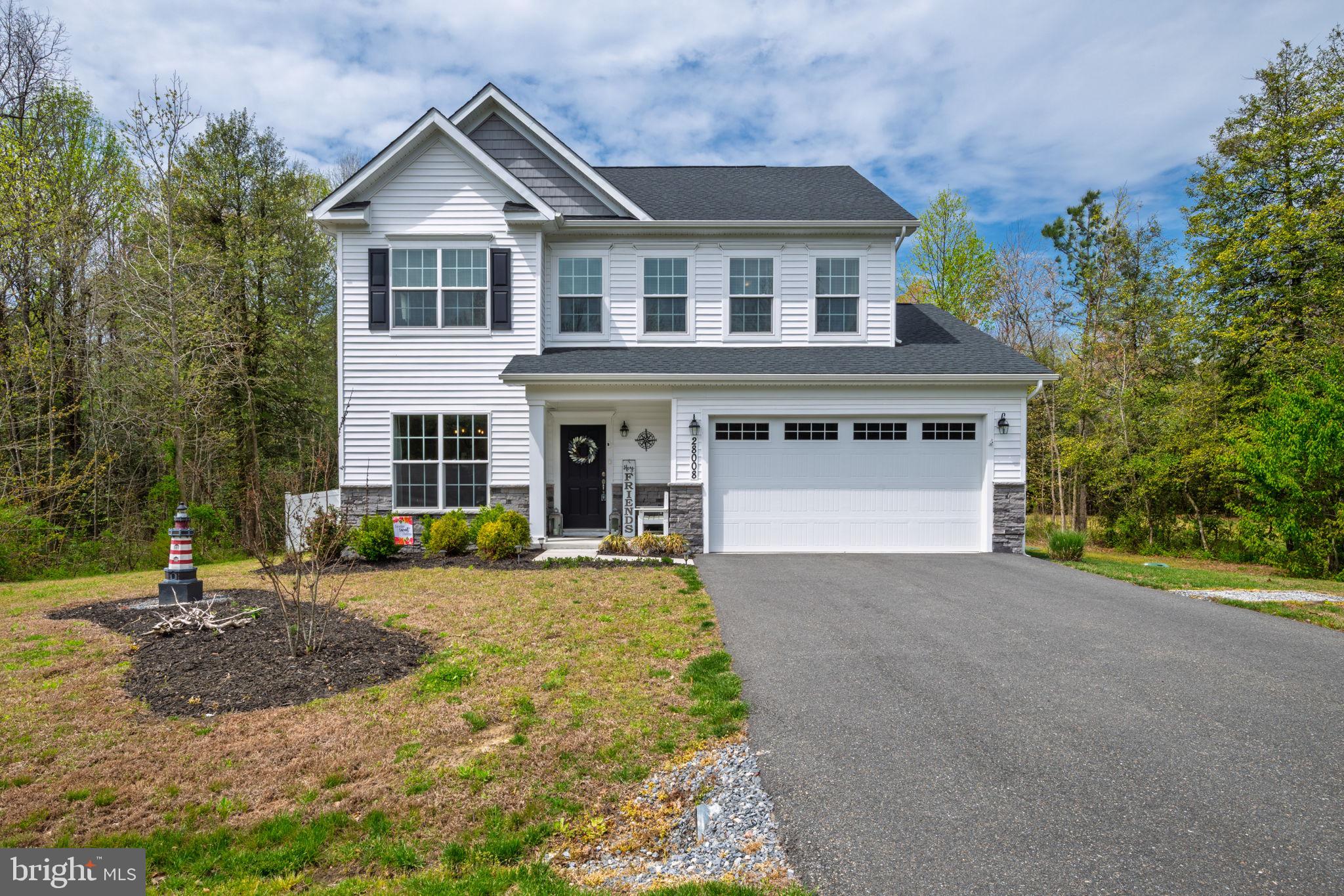 Charming spacious 4 bedroom coastal home with 2 car garage on beautiful lot with large fenced yard in a relaxing setting in the community of King Farms. Great opportunity, Motivated Seller, be sure to include this in your homes to visit.  Wonderful 1st level layout featuring a open floor plan kitchen & family room with gas fireplace, formal dining room and den. Welcoming foyer and bright dining room with decorative chair rail molding. Modern island kitchen with granite counter tops, stainless steel appliances, pantry and a slider doors off kitchen that open to a large patio perfect for outdoor living with spacious yard and privacy fence.  Spacious master suite on 2nd level with double vanity, luxury tiled shower and large walk-in closet. Three additional bedrooms on the 2nd level and separate laundry room with full size energy efficient front load washer and dryer. Lot size will accommodate an additional drive to the side of the house by the fence gate for a detached building structure/garage in the rear of the lot with approval from HOA and county. This lovely home is in a great  scenic location between Routes 13  and 113 with easy drive to Laurel, Salisbury, Georgetown, Millsboro and Selbyville. Just a 10 minute drive to Trap Pond State park to enjoy wonderful outdoor activities. All this plus affordable HOA with $400 annual HOA fees.