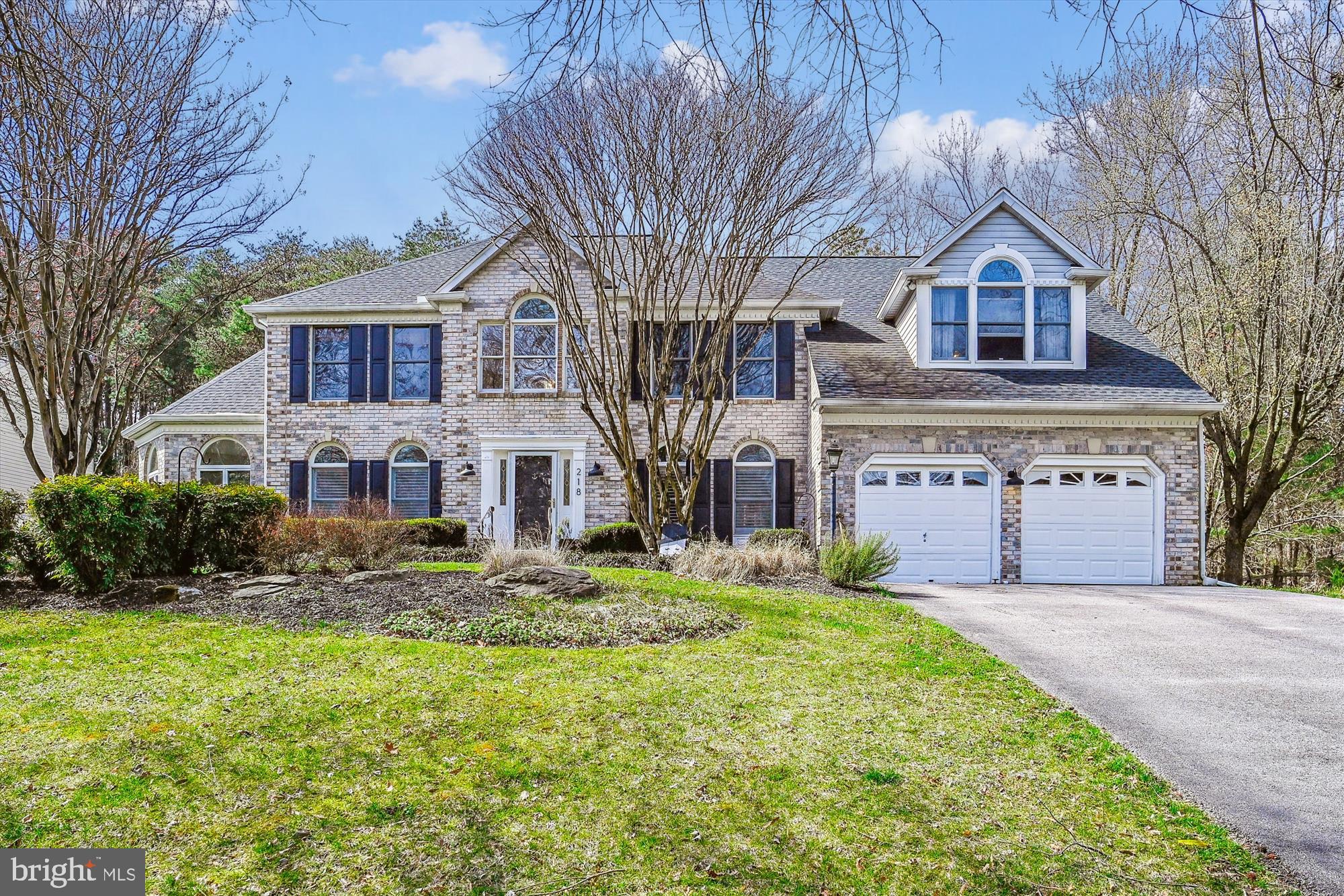 Stately brick-front Colonial in sought-after community of Brittingham. This stunning home will wow you and won't last long! This home features 5 upstairs bedrooms and 3.5 baths. The spacious and open floor plan showcases a two-story family room, main floor office, and a spacious conservatory. Recent updates and upgrades include a recently renovated kitchen with brand new white cabinets and granite, new roof with architectural shingles, gleaming hardwood flooring that has been refinished, and updated owner's bathroom with new ceramic flooring and claw tub. The dual-zone HVAC will keep your temperature perfectly regulated, and one of the units is brand new. The basement is finished with a large open recreation area. The backyard is a private oasis backing to trees, with a deck overlooking a saltwater heated pool and basketball court. You’ll love your close proximity to Kinder Park, Severna Park schools, shopping, fine dining, recreation, and major highways.