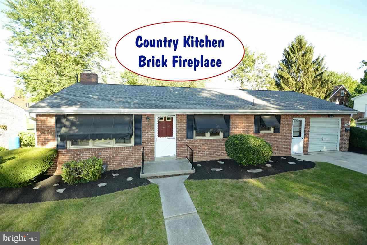 Rancher - InTown Location - Walk to Shopping - Country Kitchen - Finished Family Room in Lower Level with Brick wood Burning fire Place & Laundry and 1/2 Bath Screened Covered Patio overlooks Private Back Yard - Appliances included - Central Air - Gas Heat