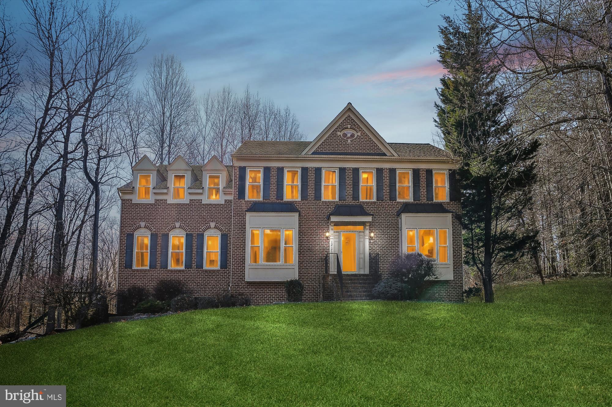 Nestled at the end of a quiet cul-de-sac is this stunning brick-front colonial offering 4 bedrooms (plus bonus)  on a private 1-acre lot that backs to woodlands. Step inside to find elegant and freshly  buffed and poly'ed hardwood flooring throughout the finished levels, a versatile main-level den/study, and formal living and dining rooms. The beautifully updated gourmet kitchen boasts a brand-new double wall oven, new  quartz countertops, and a spacious casual dining area, seamlessly flowing into the inviting family room with a cozy gas log fireplace.  The upper-level primary suite (one of FOUR+ bedrooms) features soaring vaulted ceilings, dual walk-in closets, and a luxurious en suite with a soaking tub and separate shower.
The expansive unfinished basement offers endless possibilities—think home gym, yoga studio, or game room. FUN FACT : the oversized, side load 2+ car garage is deep enough to accommodate two 1940 Willys Jeeps along with all your tools and gear.  Enjoy enhanced energy efficiency with over 30 brand-new vinyl-clad windows, plus peace of mind with a  50-year roof.   Additional features include a Rainbird irrigation system, new water treatment and fire suppression systems, and a play area that conveys with the property. Well and septic (4-bedroom perc), plus natural gas for heating, hot water, cooktop, and fireplace. This home is a rare find—schedule your tour today!