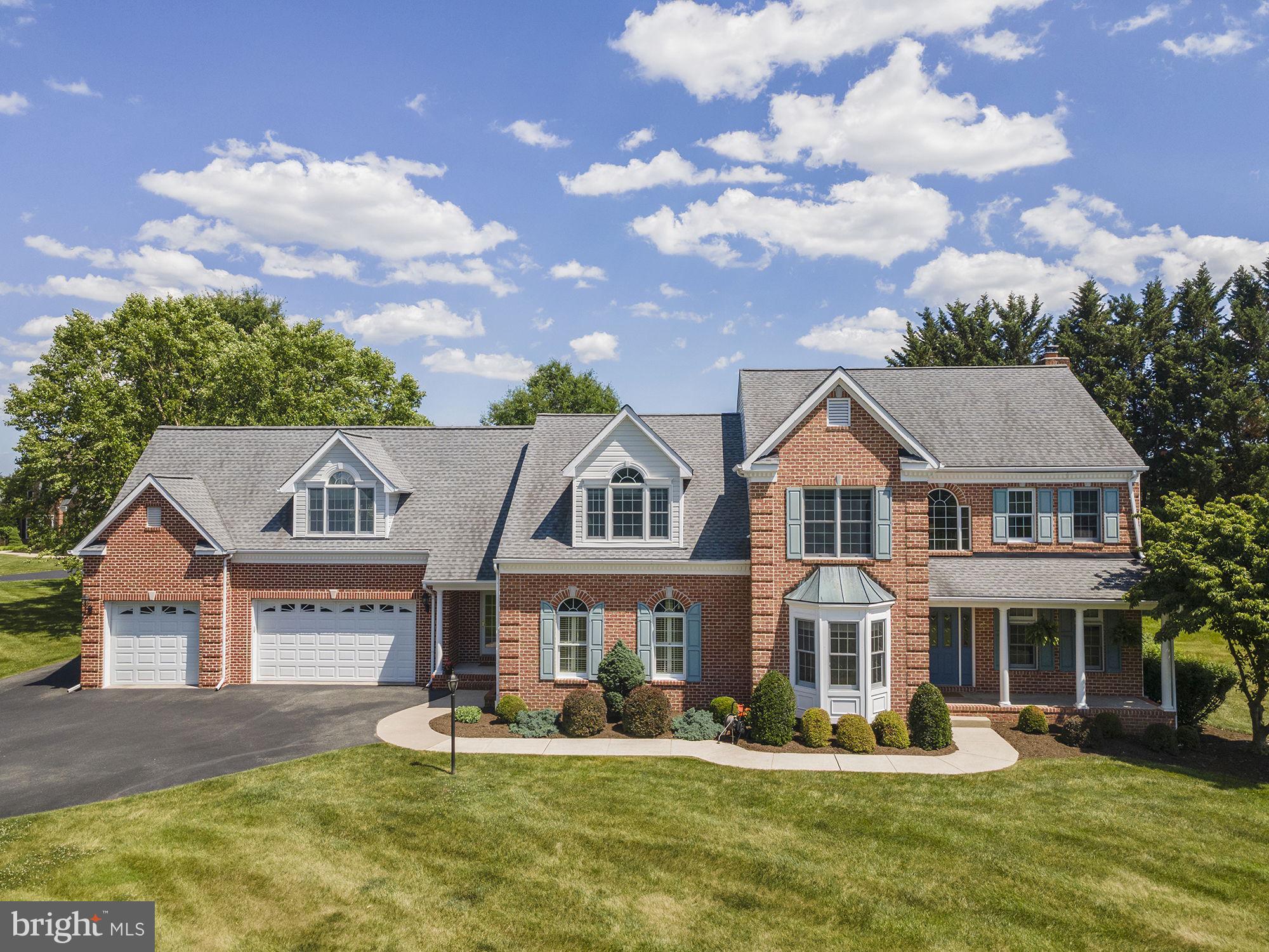 Custom-built by Clark Taylor and situated on a private 2.14-acre cul-de-sac lot in desirable Fallston, this exceptionally maintained colonial seamlessly blends timeless architecture, superior craftsmanship, generously proportioned living spaces, and thoughtful modern updates throughout. Featuring extensive millwork and custom finishes including tray ceilings, crown molding, chair rail, picture frame molding, plantation shutters, and transom windows with custom blinds. A welcoming front porch, dedicated dining room, and expansive level rear yard provide excellent spaces for both everyday living and entertainment. The classically designed kitchen features granite countertops, a center island, raised-panel cabinetry, and roll-out shelving. A sun-filled eat-in area with built-in seating and abundant windows creates an inviting setting for casual meals, while the adjoining family room, centered around a Harman pellet stove insert, provides a warm and welcoming space for family and guests alike. The thoughtfully designed floor plan offers exceptional flexibility with five bedrooms, four and a half baths, a first-floor suite with a private entrance ideal for multigenerational living, guests, or a home office, and a dedicated theater room equipped with an 80-inch television and Denon/Klipsch surround sound system. The main-level laundry room has been updated with custom cabinetry, while the spacious primary suite features a recently renovated walk-in marble shower and marble dual vanity. Additional features include a four-zone HVAC system, a 500-gallon underground propane tank serving select appliances and heating systems, a RainSoft water treatment system, two 200-amp electrical services, and a GAF Timberline architectural shingle roof installed in 2019. The unfinished lower level offers 9-foot ceilings, epoxy flooring, LED lighting, abundant storage, and outstanding potential for future expansion. Outdoor living spaces are highlighted by a 420-square-foot Trex/TimberTech composite deck and a spacious 710-square-foot three-car garage. Combining the privacy of a picturesque 2.14-acre setting with convenient access to parks, recreation, shopping, dining, and commuter routes, this property offers the best of both worlds and won’t disappoint!