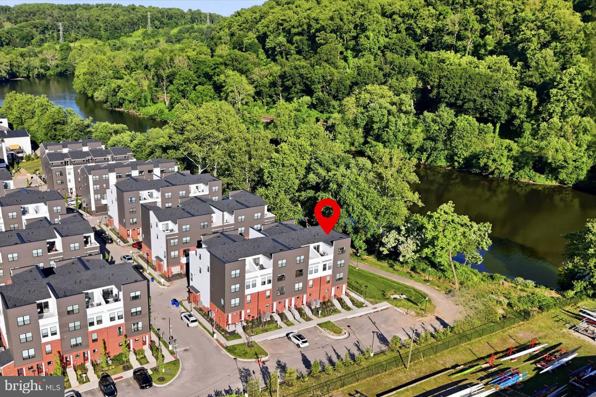 RIVERFRONT END UNIT - Experience luxury riverfront living in this vibrant, award-winning townhome community, named “Townhome Community of the Year.” Just five months young, this upgraded end-unit townhome offers river views, an open-concept layout, abundant natural light, tall ceilings, oversized windows, and designer lighting throughout.

The main living level features hardwood flooring, a timeless kitchen with quartz countertops, stainless steel appliances, and seamless flow for everyday living and entertaining. The home offers 3 bedrooms and 2.5 baths, including dual owner’s suites with walk-in closets. The top level includes a wet bar and access to a private rooftop deck with beautiful river views. Not to be missed is a built-in tandem 2-car garage. 

Enjoy low-maintenance HOA living with river views, pocket parks, an observation deck, and direct access to the Schuylkill Trail and Spring Mill Train Station, all in the acclaimed Colonial School District. With a small-town feel, walkable restaurants, and quick access to I-476, I-76, the PA Turnpike, and Center City Philadelphia in under 25 minutes, this location offers the best of convenience and lifestyle. Schedule your tour today.