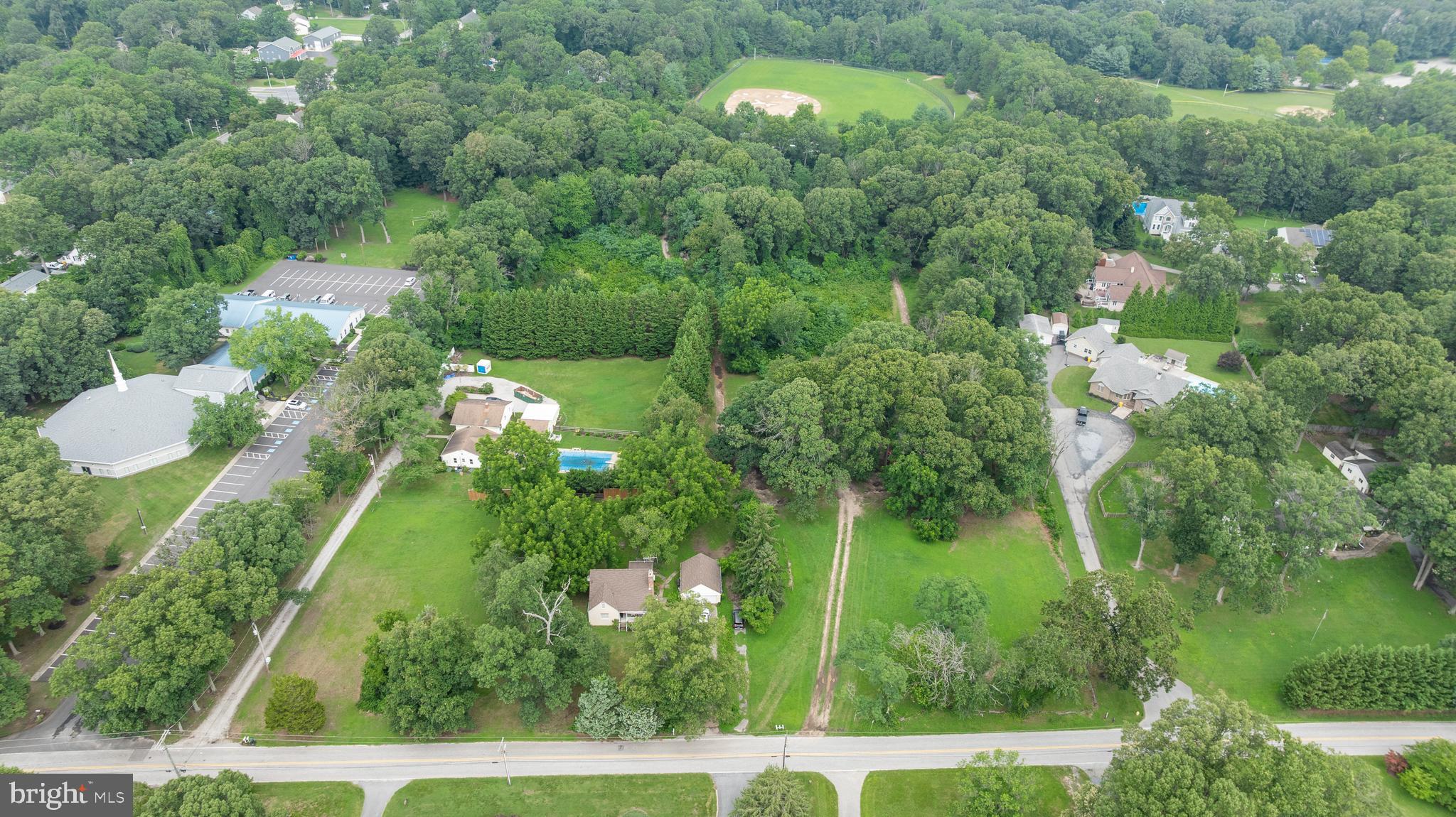 Exceptional development opportunity in Severna Park! 304 W Pasadena Road offers approximately 9 acres of R1-zoned land in a prime location. With public water and sewer available at the street, this parcel provides by-right potential for 10–11 residential lots (approx. 1 DU/acre), with the option to explore clustering or density bonuses. The property features gently rolling topography with no known wetlands, floodplain, or steep slopes, reducing development constraints. Surrounded by luxury homes and located within the sought-after Severna Park High School district, the site is also adjacent to the B&A Bike Trail and minutes from Chartwell Golf & Country Club. This tract represents a rare chance to deliver new construction homes in one of Anne Arundel County’s most desirable submarkets.