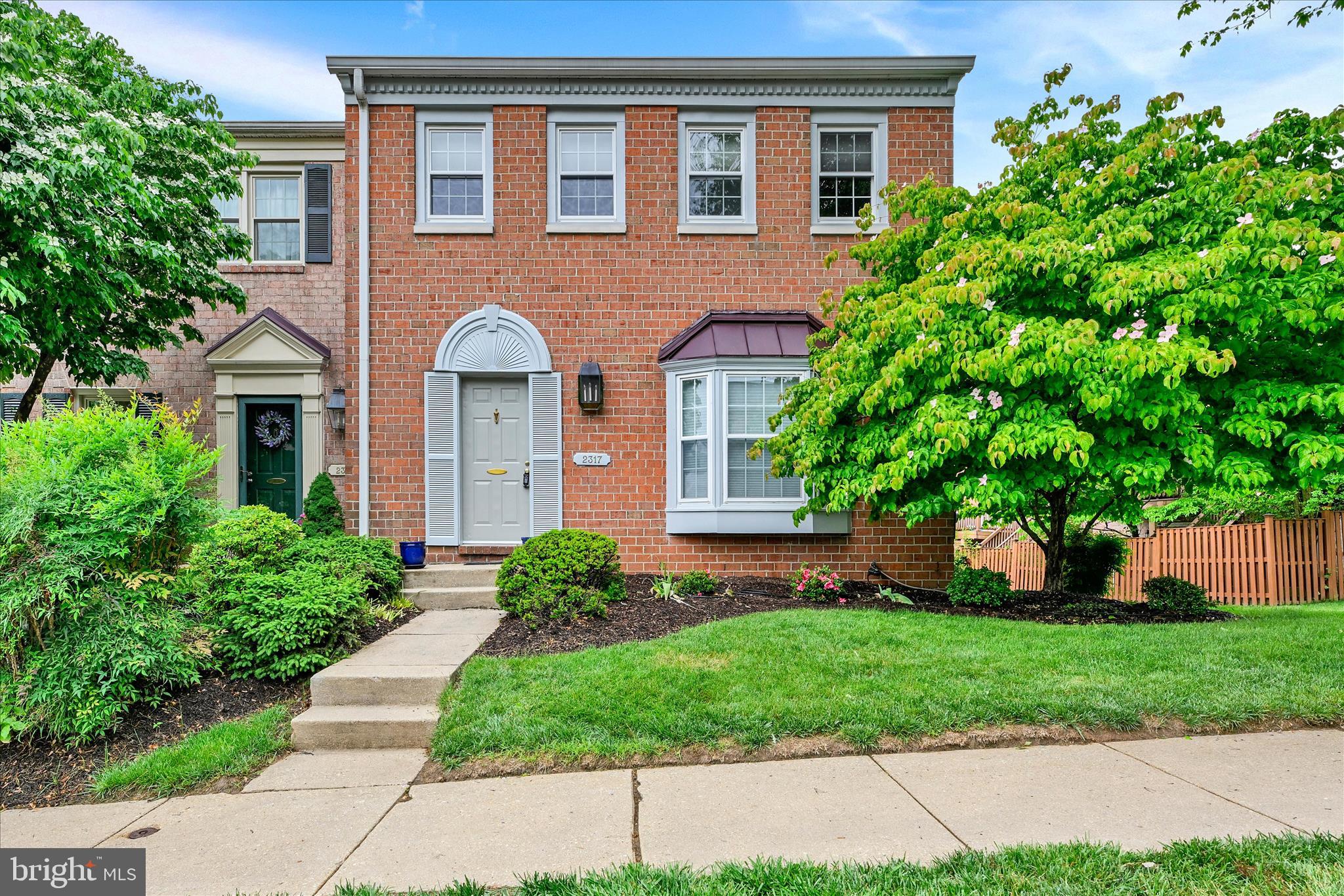 Rare opportunity in a highly sought-after neighborhood where homes seldom become available! This end-of-group townhouse offers the perfect blend of space, comfort, and style in a prime location that’s quiet, yet incredibly convenient to everything.

Beautiful hardwood floors flow throughout the main level and continue upstairs, adding warmth and continuity throughout the home. The inviting living space is highlighted by a cozy fireplace—perfect for relaxing or entertaining.

A main-level bonus room provides the perfect space for a home office, playroom, or flex area to suit your needs.

The home features generously sized bedrooms with ample closet space, providing both comfort and functionality. A fully finished basement offers valuable additional living space—ideal for a family room, home office, or guest area.

Step outside to a nicely sized deck, perfect for outdoor dining or unwinding in a peaceful setting.