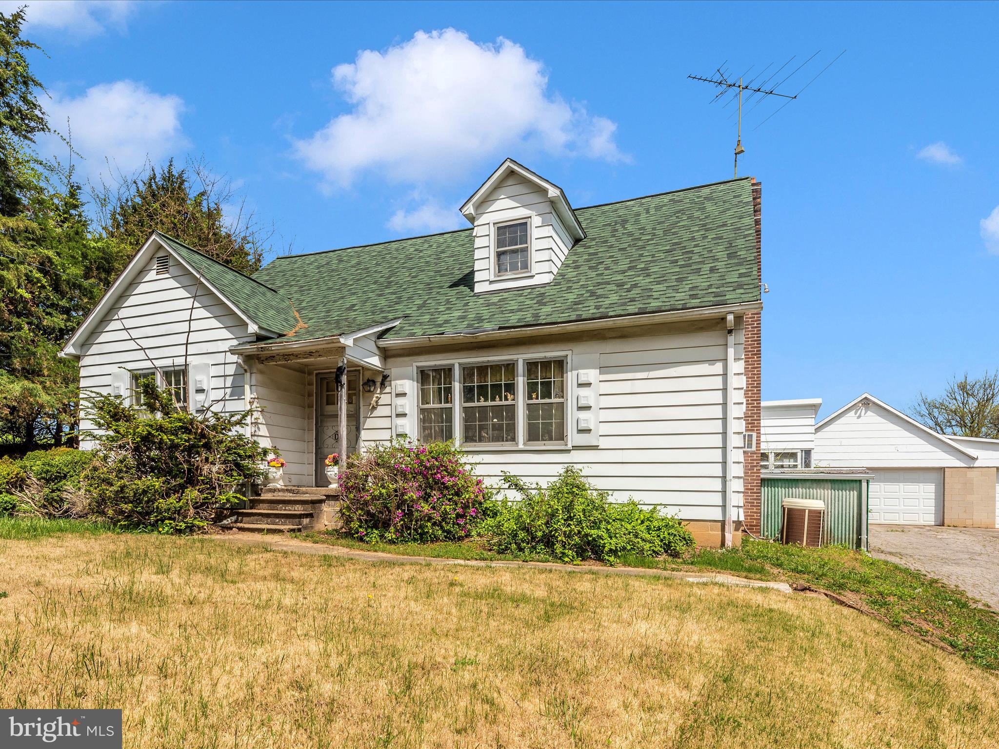 Opportunity meets potential on this nearly 3-acre property! This 4-bedroom, 1.5-bath home is ideal for investors, contractors, or buyers looking to roll up their sleeves and create something special. Hardwood floors flow throughout the main and upper levels, offering a solid foundation to build on. Outside, a massive 3-car detached garage (35x22) with a mechanic’s pit is perfect for hobbyists or professionals, and multiple outbuildings provide extra space for storage, work, or play. Located close to all amenities and major commuter routes, this property delivers both convenience and room to grow. Sold AS-IS — bring your vision and unlock its full potential!