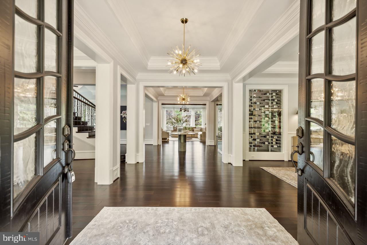 Experience the pinnacle of luxury living in the Rosewood Estate, an exquisite property cradled by trees with endless view of horse pastures, minutes from city life. This spectacular offering, set against the prestigious backdrop of Virginia’s first historic and scenic byway, perfectly harmonizes timeless elegance with modern sophistication, making it one of Northern Virginia’s most distinguished homes. 

Designed by the highly acclaimed & award-winning architect, James McDonald, the Rosewood Estate is elegantly proportioned and meticulously detailed throughout three finished levels and nearly 11,000 square feet of beautifully appointed living spaces. Rosewood is a sanctuary of sophistication, integrating both indoor and outdoor living, embodying an unparalleled level of craftsmanship, refinement and rich textures.

A grand vision of luxury combining elements such as multi-dimensional Brazilian teak hardwood flooring, wrought iron railings, designer fixtures, and solid wood cabinetry, Rosewood is crisp, bespoke, and takes luxury to a level appreciated by even the most discerning buyers. 

Explore it all by elevator, indulge in the spacious formal and informal living areas of Rosewood, each designed to balance grandeur with intimacy. The formal sitting parlor invites lavish gatherings, while the great room, warmed by the custom stone fireplace and exposed beams offers a more relaxed retreat. At the heart of Rosewood is a true culinary masterpiece, showcasing a seamless blend of artisan cabinetry, majestic prep surfaces, and elite appliances. The floor to ceiling windows that adorn Rosewood, capture an illuminating radiance indoors, while displaying endless outdoor views of picturesque horse pastures and untouched forest landscapes. Its effortless and level landscape is awaiting the perfect pool or secret garden. 

Please ask for floor plans, a virtual tour and additional information.  Schedule your private showing today, financial references required for showings.