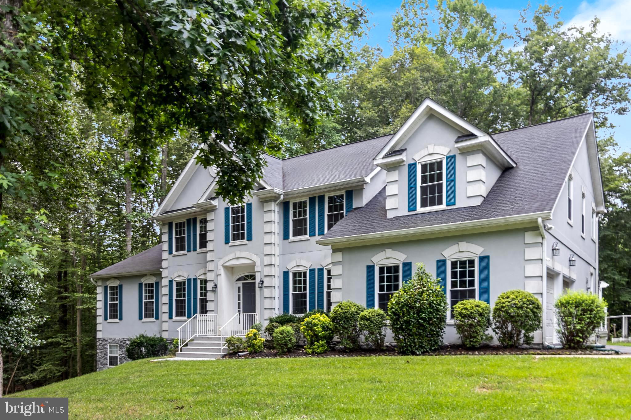 Welcome to this beautiful 6-bedroom, 4.5-bath home nestled in the established, serene neighborhood of Locust Grove Estates with no HOA or restrictive covenants. This well-maintained home offers an exceptional blend of comfort, space, and timeless appeal. The main level features a two-story family room with abundant natural light and a cozy fireplace. Both a formal dining room and a formal living room, ideal for hosting special occasions. A dedicated home office provides a private, productive space. The heart of the home is the eat-in kitchen, complete with granite countertops and stainless-steel appliances. Just off the kitchen is a mudroom which includes a utility sink, washer, dryer and additional cabinetry for everyday convenience. * Enjoy the flexibility of two primary suites - one on the main level and another on the upper level - each with its own en-suite bath, ideal for multi-generational living or guests. The upper level has an additional 3 bedrooms, full bath and a catwalk overlooking the family room. The fully finished basement offers incredible versatility and additional living space, featuring a spacious recreation room, two additional rooms, a full bath and a private bedroom/apartment suite with its own separate entrance. There is also a bar and full-sized refrigerator.  Whether you envision a home theater, game room, or private in-law suite, this lower level delivers endless possibilities with comfort and style. 
Step outside to a beautifully designed backyard oasis with a low-maintenance Trex deck, paver patio, pergola, and hot tub—perfect for relaxing or hosting gatherings year-round. With generous living space, thoughtful updates, and a warm, welcoming atmosphere, this home offers everything you need and more. 
Conveniently located with two exits out of the neighborhood. Only 3 miles to downtown La Plata with shops and restaurants. Easy access to Rt. 301 and Rt. 210. Also nearby is the newly renovated Port Tobacco Restaurant where you can enjoy waterfront dining as well as the marina and boat ramp. Don’t miss the opportunity to make this home yours - schedule a private tour today!