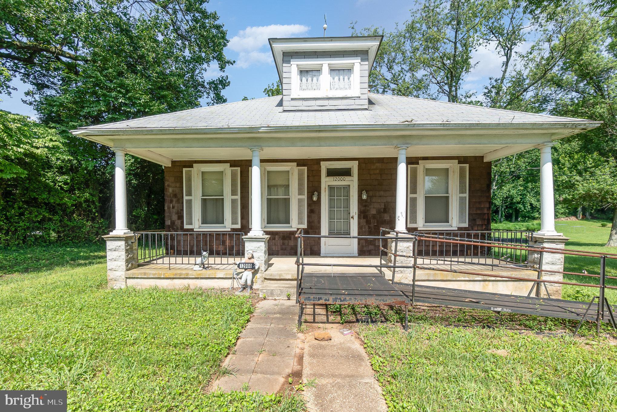 OFFER DEADLINE: Thursday March 12th 5:00PM.  Welcome to 12000 Belair Road, an exceptional opportunity to own a large parcel in the heart of Kingsville. This 2.2-acre property features a 1.5-story home in as-is condition, a detached two-car garage, and three additional sheds, offering space for storage, workshops, or future development.

The true value lies in the land and the highly desirable location — with direct frontage along Belair Road, the property benefits from two separate driveways on Belair Road as well as an additional driveway entrance from Sunshine Avenue, providing flexible access for future use.

Whether you envision renovating the existing home, building new, or exploring business or mixed-use options (zoning to be confirmed by buyer), this is a rare chance to create something special in a high-visibility corridor. With over 95,000 square feet of land and multiple outbuildings, the possibilities are wide open.

Sold strictly as-is. Bring your creativity, confirm your plans with the county, and seize this unique opportunity to shape the future of this well-positioned Kingsville property.