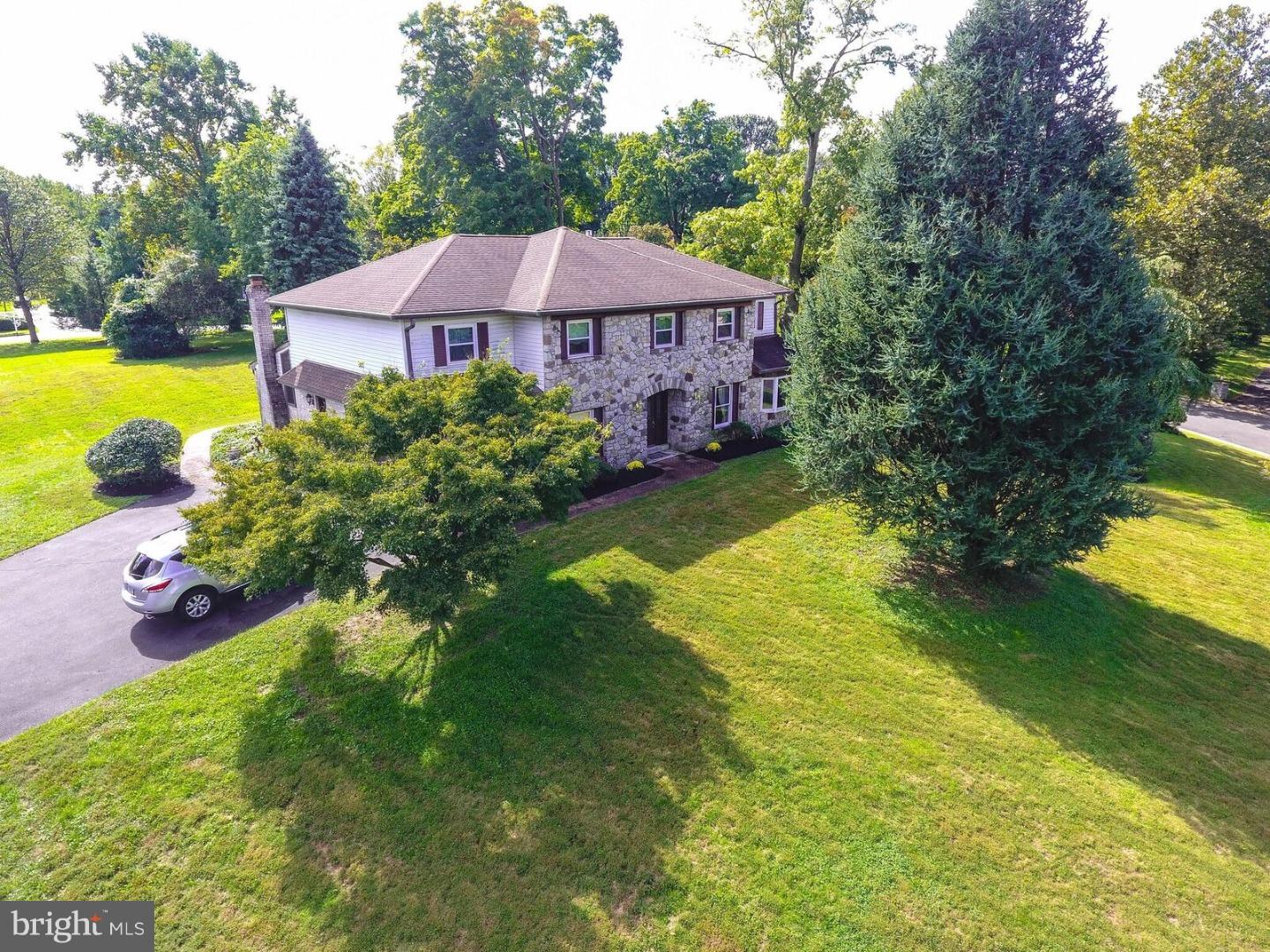 Surrounded by Huntingdon Valley's most prestigious homes you'll find this custom built colonial with 3752 int sq ft, uniquely situated in a large private cul-de-sac on a premium 1.15 acre lot.  Grand foyer entry with turning stair case and teak hard wood flrs, formal living rm and dining rm with 9 ft ceilings, gleaming hardwood flrs, custom moulding and a bright & tranquil sunroom just off the dining rm.  Kitchen features include solid wood cabinets, granite countertops, marble floor, Jenn Air electric range/oven and a walk-in pantry. Fam rm with floor to ceiling stone- gas fireplace and double French doors leading out to the new rear patio and grilling area with a peaceful view of manicured grounds. Convenient 1st flr powder rm and separate laundry with doors to side driveway and 2 car garage. There are 4-5 bedrooms and 2 full baths located on the 2nd floor plus a huge open bonus room which could be used as another bedroom, office, playroom or, whatever fits your needs. Huge mstr bedroom with sitting area, walk in closets and a recently updated mstr bath with a beautiful double vanity and a granite countertop, custom lighting and an oversized walk around shower. 3 additional bedroom with plenty of closet space. New central air.  Huge "dry" basement  You'll find endless space for storage and more! The homes in "Lorimer Pond Estates" are for today's sophisticated buyers!    Easy to see.