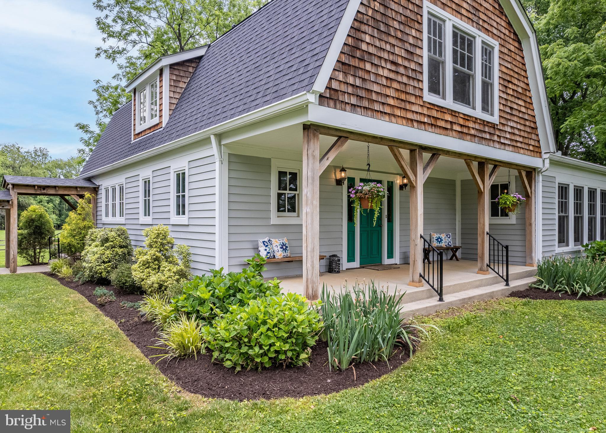 Excellent Indoor-Outdoor Living at 1300 Parrs Ridge Drive, Silver Spring/Spencerville - close to DC!

Quintessential 1995 custom-built Timber Frame Dutch Farmhouse country estate, on nearly 4.5 acres offer a rare blend of refined living and endless possibilities. This is a versatile property with many possible uses, centered around a main residence that is a true masterpiece of craftsmanship. 

Step inside to discover a breathtaking interior defined by classic timber-frame architecture. Massive exposed posts, horizontal beams, and structural knee braces bring unparalleled warmth and rustic elegance to every room.

The kitchen is beautifully integrated into the home featuring abundant wood cabinetry, a central butcher-block island, two ovens, a prep sink, and a light-filled breakfast bay that provides a peaceful spot for morning coffee surrounded by nature.  Flowing seamlessly from the kitchen, the great room serves as the breathtaking core of the home. This massive, open-concept living and dining area is crowned by soaring vaulted ceilings and the home's signature authentic timber framing. Rich, reclaimed wide-plank chestnut floors anchor the expansive space, leading the eye to a magnificent floor-to-ceiling brick fireplace that commands the living room. Along the dining area, a sweeping wall of custom wood built-ins offers incredible storage and display space. To complete the picture, a wall of bright, white-trimmed windows floods the room with natural light and provides uninterrupted views of the lush, equestrian grounds.

The home features an expansive and highly functional layout, offering three bedrooms and two-and-a-half bathrooms on the main level—including a stunning primary suite that overlooks the tranquil pasture and backyard. Upstairs, you will find a private retreat with two additional spacious bedrooms and another full bathroom. This thoughtful floor plan is complemented by an oversized, unfinished basement that serves as a massive blank canvas for a future gym, media room, or personal workshop.

The property’s exterior infrastructure is equally impressive and meticulously designed for the modern hobbyist or equestrian. A detached carriage-style garage features a private, full apartment on the upper level—an ideal solution for a guest suite, rental income, or a secluded home office. This building also includes a separately enclosed workshop on the ground level, complete with its own bathroom and a dedicated washer and dryer. For those with a creative or entrepreneurial spirit, the large detached outbuilding with concrete floors and a loft is a standout feature; it is perfectly suited to function as a professional workshop for a business, a vibrant artist gallery, or a secure space for tractors and heavy equipment.

Equestrians will appreciate the functional barn, which features a run-in area, two stalls, and ample storage for tack and hay. The property boasts three separately fenced pastures, including a nearly level front pasture perfectly suited for schooling horses. Beyond your own gates, Woodland Horse Center and Periwinkle Farm are both just a short hack away, while the local Pony Club practice in Sandy Spring is a quick 10-minute drive 

This location offers the best of both worlds, providing seamless access to major commuter routes just 16 miles from DC in Montgomery County, plus the diverse shopping and dining of Olney or Burtonsville, all while ensuring you have expansive privacy and space.

This estate comprises two distinct lots with no agricultural tax assessments. The primary lot (tax ID 05-00259157) is approximately 3.81 acres and is zoned RC (rural residential). The smaller lot (tax ID 05-00259168) is approximately 0.459 acres and is zoned RE1.

Shown by appointment only. Please do NOT walk the property without an appointment.