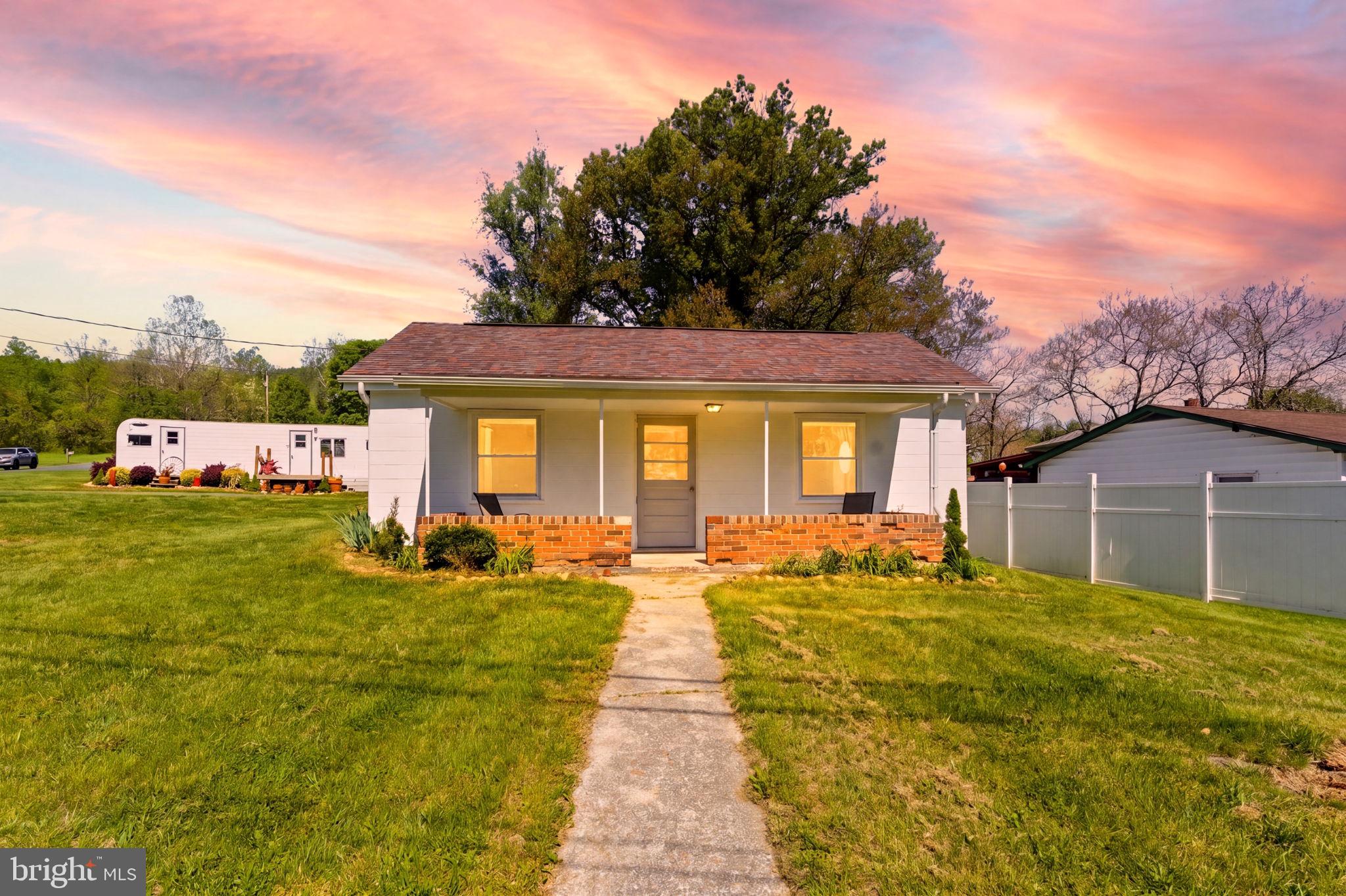 Welcome Home to 1505 Loop Rd, a charming ranch-style retreat nestled on a peaceful 0.40-acre lot in scenic Gerrardstown! Built in 1960, this 2-bedroom, 1-bath home offers comfortable one-level living with classic character and completely newly remodeled.  Step inside to find a bright and inviting living room filled with natural light, creating a warm and welcoming atmosphere. The spacious kitchen offers ample cabinet storage and room for casual dining, making it both functional and inviting for everyday living. Brand new cabinets and appliances. Both bedrooms are conveniently located on the main level and feature hardwood flooring, adding to the home’s timeless appeal. Outside, you’ll appreciate the generous lot size—perfect for gardening, entertaining, or simply enjoying the quiet country surroundings. The property is well-equipped with a 2-car detached garage, covered parking, additional off-street parking, and a storage shed. As an added bonus, a camper conveys with the sale, offering flexible use for guests, rental potential, or extra storage. Located just a short drive from Martinsburg, Inwood, and I-81, this home offers a balance of rural tranquility and commuter convenience. Whether you’re searching for a starter home, downsizing, or seeking a weekend getaway, 1505 Loop Rd is full of possibilities—schedule your showing today!