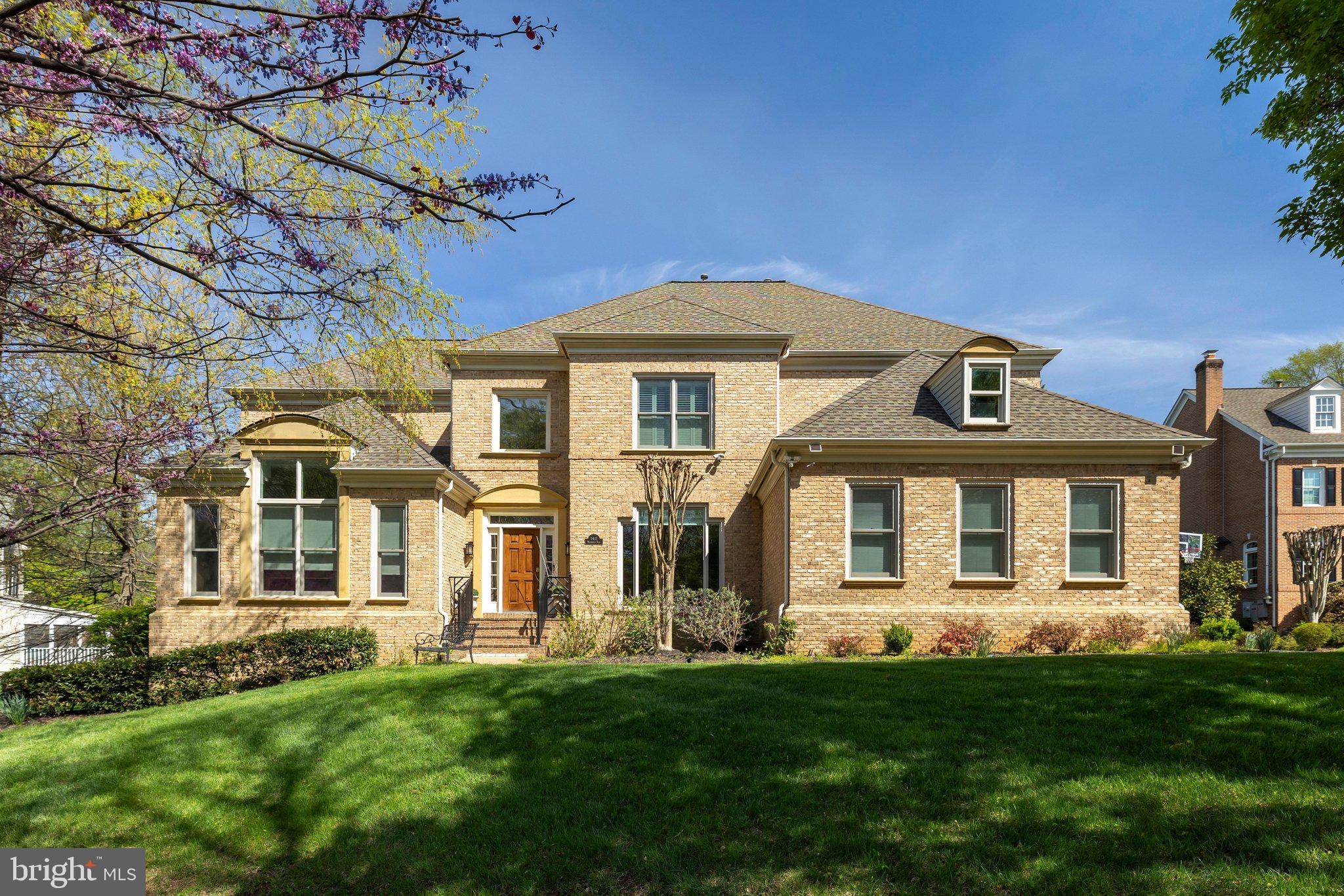 Magnificent residence on a beautifully treed, professionally landscaped lot in highly sought-after McLean 100. This exceptional home features soaring ceilings and a dramatic open floor plan with walls of windows that flood every room with natural light. Elegant architectural details include coffered and tray ceilings, gleaming hardwood floors on two levels, handsome moldings and wainscoting, and a grand foyer. The main level offers expansive living and entertaining spaces: a stunning two-story great room, large library with custom built-ins, and hearth room with built-ins and two-sided fireplace off the kitchen. The custom kitchen with grey and white cabinetry opens seamlessly to the family room—ideal for both everyday living and entertaining. This 6-bedroom, 5.5-bath home includes a desirable main-level primary suite with spa-inspired bath and steam shower. The upper level features four spacious bedrooms and three fully renovated bathrooms. The huge walk-out lower level is fully finished and sun-filled, with luxury vinyl plank flooring, an additional bedroom and full bath, and expansive flexible space perfect for a recreation room, gym, or guest suite. Exceptional outdoor living includes a large screened porch and Trex deck overlooking a flat, private backyard with fountain—an ideal setting for relaxing or entertaining.Magnificent residence on a beautifully treed, professionally landscaped lot in highly sought-after McLean 100. This exceptional home features soaring ceilings and a dramatic open floor plan with walls of windows that flood every room with natural light. Elegant architectural details include coffered and tray ceilings, gleaming hardwood floors on two levels, handsome moldings and wainscoting, and a grand foyer. The main level offers expansive living and entertaining spaces: a stunning two-story great room, large library with custom built-ins, and hearth room with built-ins and two-sided fireplace off the kitchen. The custom kitchen with grey and white cabinetry opens seamlessly to the family room—ideal for both everyday living and entertaining. This 6-bedroom, 5.5-bath home includes a desirable main-level primary suite with spa-inspired bath and steam shower. The upper level features four spacious bedrooms and three fully renovated bathrooms. The huge walk-out lower level is fully finished and sun-filled, with luxury vinyl plank flooring, an additional bedroom and full bath, and expansive flexible space perfect for a recreation room, gym, or guest suite. Exceptional outdoor living includes a large screened porch and Trex deck overlooking a flat, private backyard with fountain—an ideal setting for relaxing or entertaining. 12hr notice required for showing.