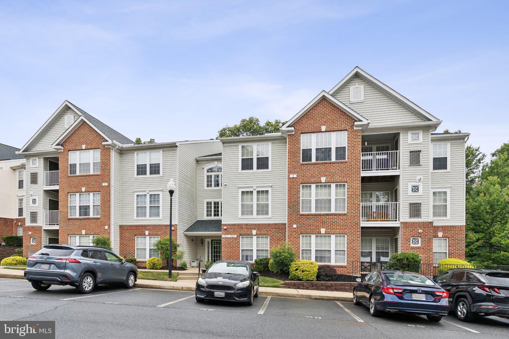 Your new condo has been freshly painted and is in immediate move-in condition.  The front entrance area is locked and secure. Entrance area to your home is well lit during the day with natural light.  Once inside, you will immediately notice the 14' vaulted ceilings and wall of windows that allow natural lighting to caress your living room. Dining room is just off the brightly lit kitchen -   enjoy all new stainless appliances.  Washer and dryer are just feet away and well hidden.  The primary bedroom offers a walk-in closet and ensuite bath. The secondary bedroom and bath is located at the opposite end of this home to allow for extended privacy.  And speaking of privacy, there is a covered balcony for your enjoyment of this peaceful wooded surrounding. This home is encompassed by a wooded and very secluded area which is calming and reserved. Parking is reserved for occupants; however, there is plenty of additional parking for visitors. Conveniently located within 5 minutes to White Marsh Mall and easy accessibility to I-95.  Twenty-five minutes to BWI Airport and just over one hour to Philadelphia International Airport. Enjoy your morning or afternoon exercise at Honeygo Run Regional Park - if you are a pickle ball player, you'll be glad you came. Considering downsizing?  Elevator access to your home and everything you need is on one floor.  Leave your lawnmower behind and keep your weekends open to relax.  This Silver Lake condo offers a low maintenance lifestyle and is very well hidden in the woods of Perry Hall, yet close enough for any need imaginable.  Be quick to schedule an appointment, you do not want to let this one get away!