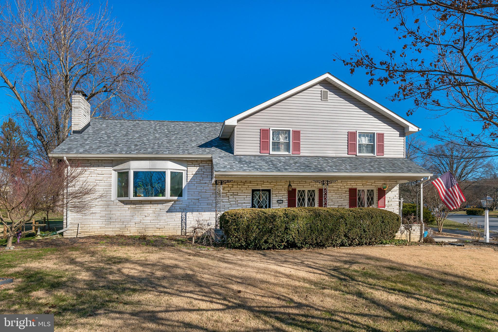 Solid brick home in quiet Colonial Manor neighborhood. 4 bedrooms, 2.5 updated bathrooms.  Cozy kitchen, formal dining room, and large living room with wood burning fireplace. Hardwood floors and 3-zoned heating.  Natural gas heat.  New roof (2018).  Lower level Family room plus huge hobby/workshop room.  Garage, shed, patio, all on corner lot, Walking distance to Conestoga Country Club.  Home warranty included.