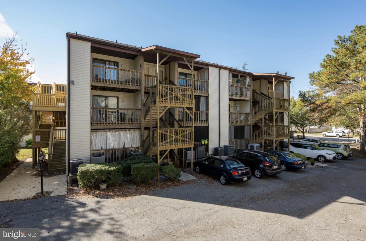 Spacious two-bedroom living with one of the best price-per-square-foot values on the market.  Fully Renovated Sandalwood Condo!
This stunning fully renovated 2-bedroom, 2-bath condo on the bay side of Ocean City, Maryland offers over 1,000 sq. ft. of beautifully updated living space just minutes from the beach. Enjoy a modern kitchen with quartz countertops and brand-new SS appliances, fresh paint throughout, stylish LVP flooring, and fully renovated bathrooms. The spacious split-level layout provides plenty of room to relax and entertain, featuring a welcoming front porch and a shared back deck for outdoor enjoyment. This turnkey home is ideal as a year-round residence, a beach getaway, or rental investment. Don't miss your chance to see it!