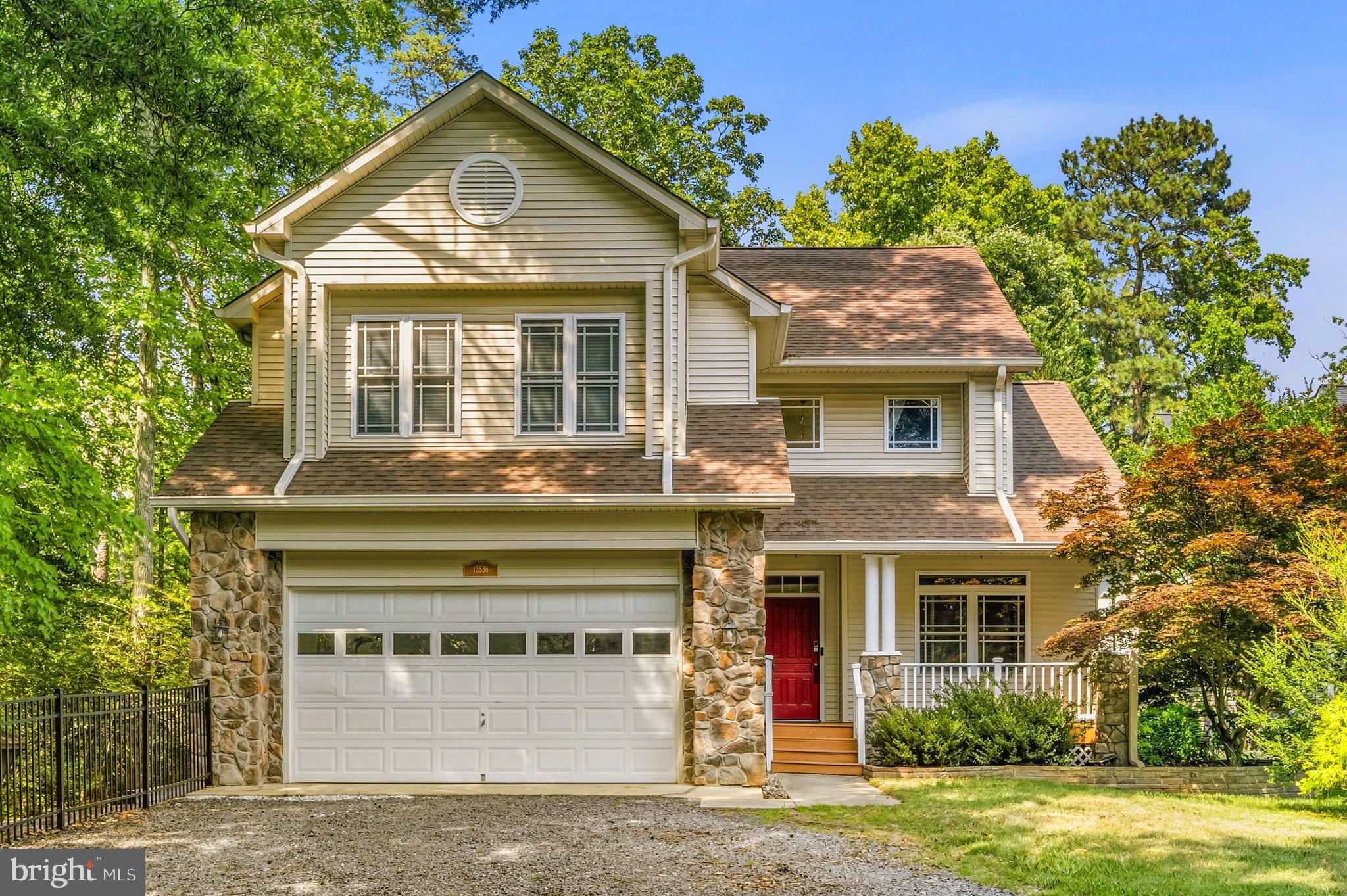 Osprey Cove is located on beautiful and protected St. John Creek. This lovely 2 story home on a finished basement has private access to pier and boatlift right from your back yard. MLW is 3'+ and 3,000lb boat lift conveys. Enjoy leisurely boat trips to Solomons Island restaurants and shops that are mere minutes away or zip around on your jetski(s). Home is 5BR with 3 Full bathrooms and has a semi-open layout on the main level with kitchen, living room w/ gas fireplace, and dining area. Granite counters and island with 2nd sink, gas range and all stainless steel appliances make the kitchen the perfect place to hang out, entertain and be the heart of your home. Additional rooms include a formal dining room (currently used as a home office) and formal living room at the main entry Upstairs there are 4 bedrooms and laundry room. The owner's suite is large enough to fit any size bed/furniture, has a generously sized closet area and an attached full bathroom with soaking tub, separate shower and dual sink vanity. Two of the secondary bedrooms have cathedral ceilings making the already spacious rooms feel even bigger! The basement is finished with a 5 room (currently used as a bedroom), living area and enclosed room perfect for a home studio or storage. There is a rough-in for a future full bathroom as desired.  Mortgage savings may be available for buyers of this listing.