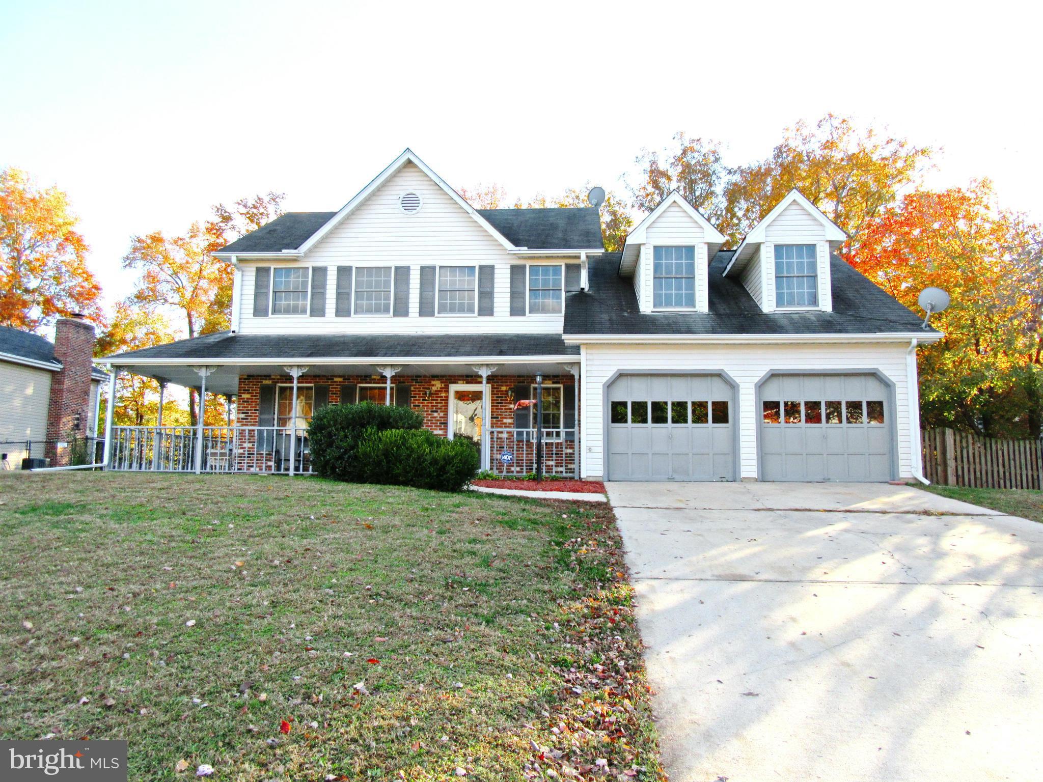 Location Location Location! 4 BR 2.5 Ba Colonial with 2 car garage and wrap around porch! Eat in kitchen w/ sep formal DR. Fam Rm off kitchen, formal LR, game room/den. Lg Mstr Suite w/ his & her closets, lux bath w/soak tub and sep shower. Huge usable fenced in back yard! Close to shopping, dining & more. No HOA! Better run...this one won't last long!!!