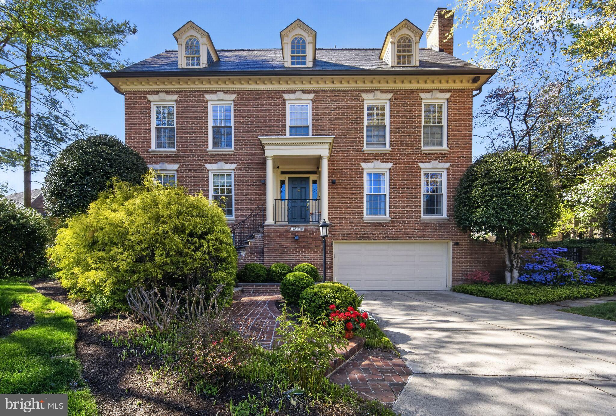 Tucked away on a quiet cul-de-sac in the sought-after Westmoreland Hills neighborhood, 5115 Cape Cod Court offers a distinguished blend of Colonial Revival architecture, generous scale, and enduring comfort. Built in 1981 and spanning four finished levels, this residence encompasses approximately 7,179 square feet of living space on a 10,395 square foot lot, providing both privacy and versatility in a prime Bethesda location. The property is set on a particularly attractive street lined with luxury homes, further enhancing its appeal and sense of prestige.
The home features seven bedrooms and five and a half bathrooms, thoughtfully distributed across its expansive layout, including four bedrooms on the second level, two additional bedrooms in the finished attic, and a private suite on the lower level. The main level is designed for both formal and informal living, with gracious entertaining spaces complemented by three fireplaces and an abundance of natural light enhanced by new double-pane windows. Hardwood flooring extends across the top three levels, adding warmth and continuity throughout.
The kitchen, equipped with marble countertops and high-end appliances, opens to a bright eat-in area and connects seamlessly to the family room, which provides direct access to the outdoor living spaces. While both the kitchen and bathrooms have been updated over time, they offer an opportunity for further personalization to suit today’s tastes.
The upper level offers additional flexibility beyond the bedroom suites, including a dedicated music room, a versatile multipurpose space, and an extra storage area equipped with a cooling system—ideal for preserving delicate items.
The lower level, with independent access and an emergency egress window, expands the home’s functionality with a spacious recreational area, a gym, a wet bar, and a newly installed wine cellar. Additional features include an alarm system, intercom, built-in speakers, and abundant storage throughout.
Outdoor living is equally inviting, highlighted by a beautifully landscaped backyard with manicured grounds, a flagstone patio with pergola, and a spacious deck—creating a seamless setting for relaxation and entertaining. A slate roof, installed in 2015, and two parking spaces complete this offering.
Ideally located in a well-established neighborhood known for its green surroundings, proximity to parks and trails, and access to highly regarded public schools, 5115 Cape Cod Court presents a rare opportunity to own a substantial home in one of Bethesda’s most desirable settings.