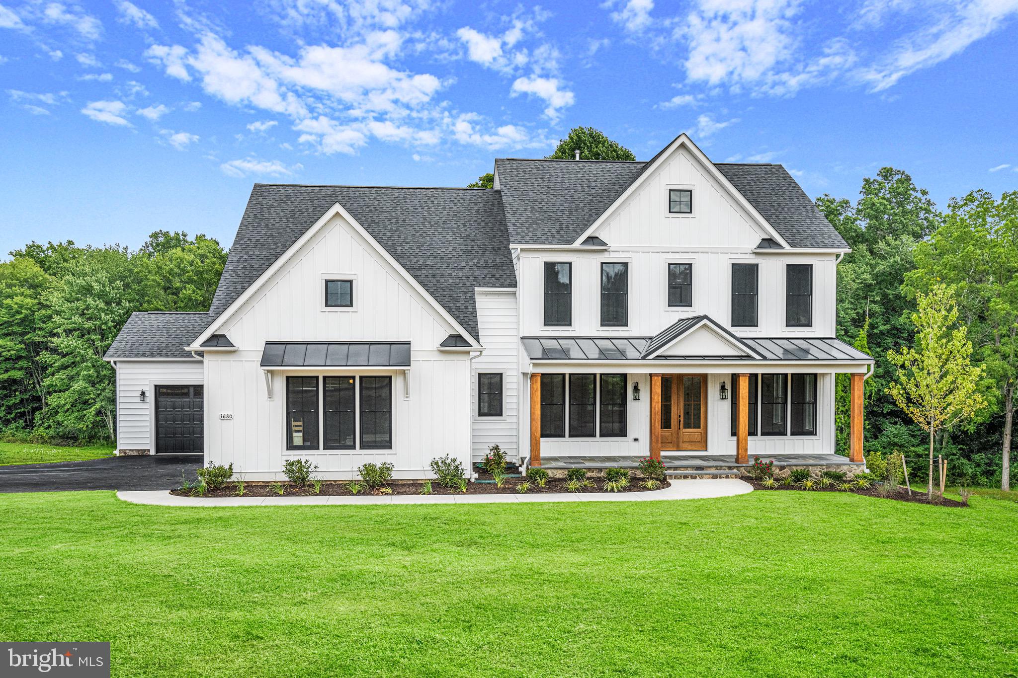 Introducing the epitome of modern luxury living in The Ridge at Falling Green of Mount Airy, MD! This brand-new, exquisitely designed Ryleigh home by Catonsville Homes is a masterpiece of craftsmanship and elegance.

Situated on a sprawling 3.02-acre home site, this residence boasts a striking upgraded vinyl siding front with stone to grade, and a welcoming full front porch, creating a picture-perfect exterior. Step inside to discover a thoughtfully curated interior, featuring 10' 1st floor ceilings, a gourmet Kitchen and Butler's Pantry with upgraded countertops and a walk-in Pantry. The Kitchen's breakfast bar seamlessly connects to a sunlit Morning Room and a spacious Family Room adorned with a cozy gas Fireplace, offering a seamless blend of style and functionality.

The 1st Floor also offers a private study off the foyer, a convenient Mud Room with built-in cubbies, and a Powder Room for added comfort. Additionally, a 5th bedroom provides flexibility and versatility to the living space. Ascend to the 2nd level to find 4 Bedrooms and 4 Bathrooms, including a luxurious Primary Bedroom suite with a large walk-in closet and an opulent Primary Bath featuring an oversized shower. The 2nd level also includes a walk-in Laundry Room for added convenience.

The finished lower level is an entertainer's paradise, featuring 10' ceilings, a Recreation Room, an Exercise Room, a Full Bathroom, and a walkout sliding glass door exit, seamlessly connecting indoor and outdoor living spaces.

This remarkable new home in The Ridge at Falling Green offers an unparalleled opportunity to experience the height of luxury living in a serene and picturesque community. Don't miss the chance to call this exceptional property your own!