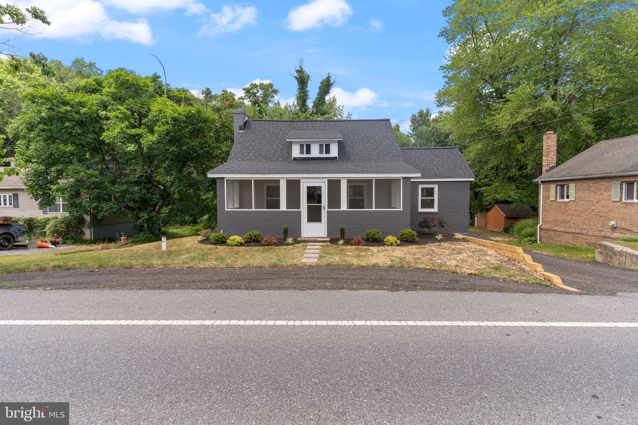 Welcome home to this beautifully renovated Cape Cod in a highly convenient location with easy access to Route 4, making commuting to Joint Base Andrews, The Pentagon, Annapolis, Washington DC, and Northern Virginia a breeze.

This move in ready home features 3 bedrooms and 3 full bathrooms along with a rare oversized detached garage and additional carport. Whether you need space for vehicles, a boat, trailer, workshop, hobbies, or extra storage, this property offers the flexibility that is hard to find.

Inside, you'll appreciate the extensive updates throughout, including a brand new kitchen with updated appliances, new bathrooms, fresh paint, new flooring, new HVAC system, new water heater, and a new roof and gutters. The bright and inviting family room just off the kitchen features soaring vaulted ceilings, creating an open and spacious feel that sets this home apart.

The updated kitchen offers plenty of cabinet space, modern finishes, and a dedicated coffee bar area perfect for your morning routine. Step outside to the expansive rear deck, ideal for summer barbecues, entertaining guests, or simply relaxing outdoors.

The private upper level primary suite includes its own full bathroom, while the main level offers two additional bedrooms and two more full bathrooms, providing comfortable living space for family and guests.

A classic front porch adds timeless curb appeal and welcomes you home each day. With its combination of modern updates, unique features, oversized garage space, and commuter friendly location, this home checks all the boxes.

Don't miss your opportunity to make this one yours before it's gone!